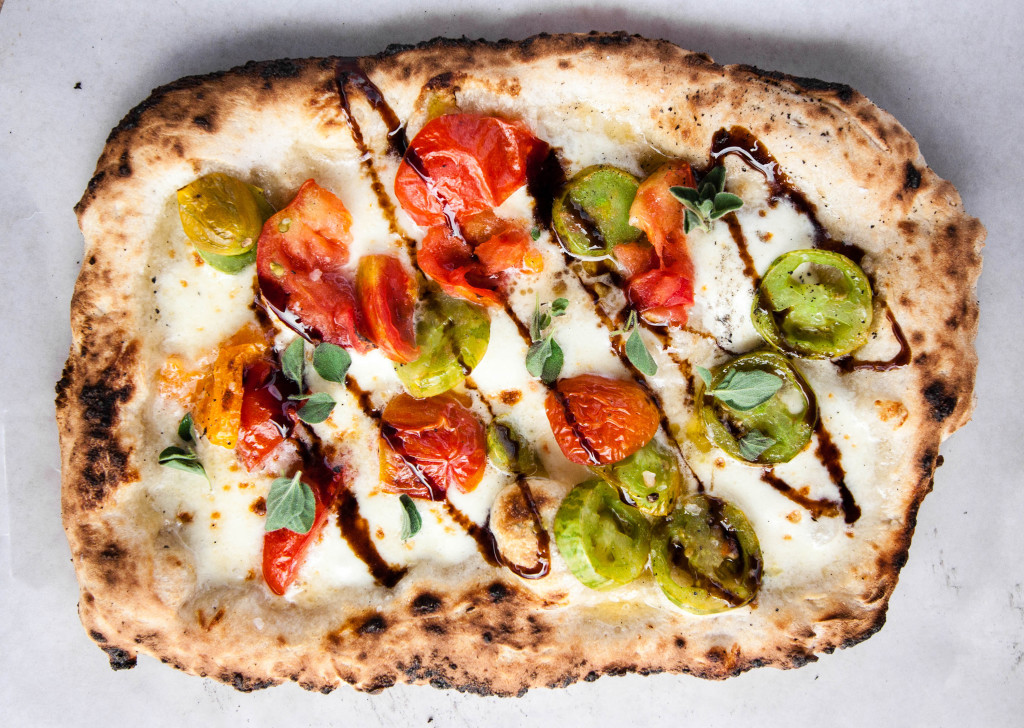Green and Red Cherry Tomatoes with a Balsamic Glaze Drizzle and Fresh Oregano