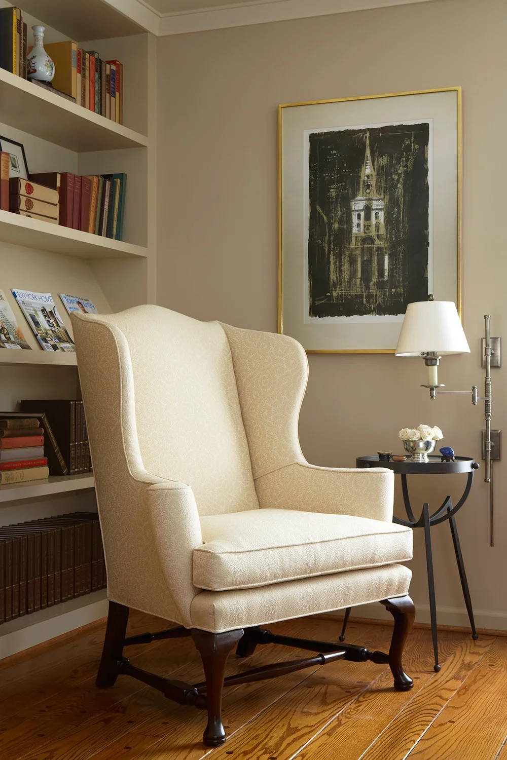 I remember the first day I walked into this home…I thought I’d made a wrong turn and was in Greenfield Village! It was way too literal in its colonial direction. Thankfully, my wonderful clients agreed--They wanted a more modern feel. We got rid of the heavy drapery, reupholstered their settee, painted the woodwork a darker color so it would pop, and added new, clean-lined furniture and accessories to complement what they already had. Provided it works, we love to re-use pieces our clients already own; the result is totally fresh, but familiar and comfortable for them. Photo by Beth Singer.