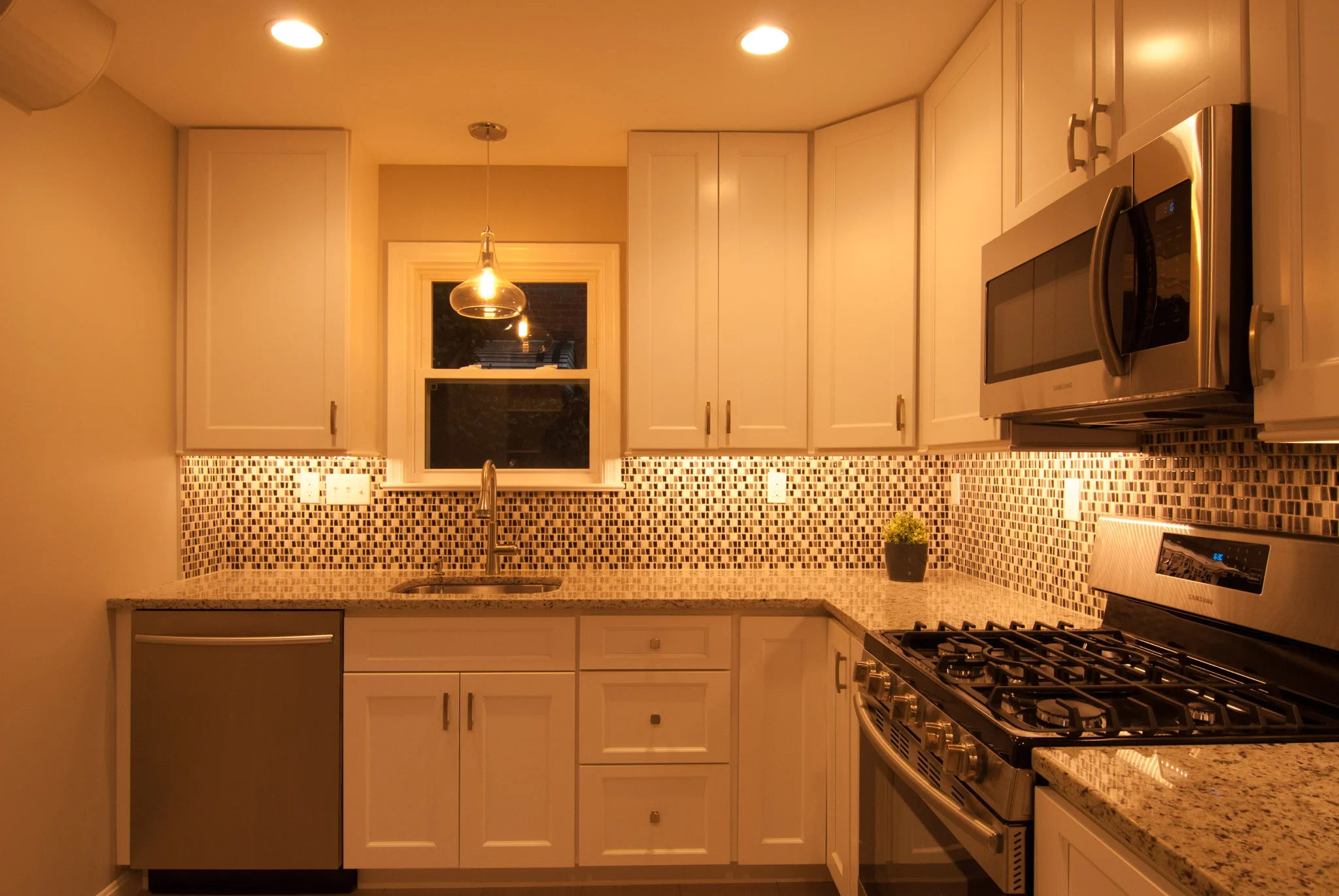 Ambient light photo of the kitchen. Check out that window!