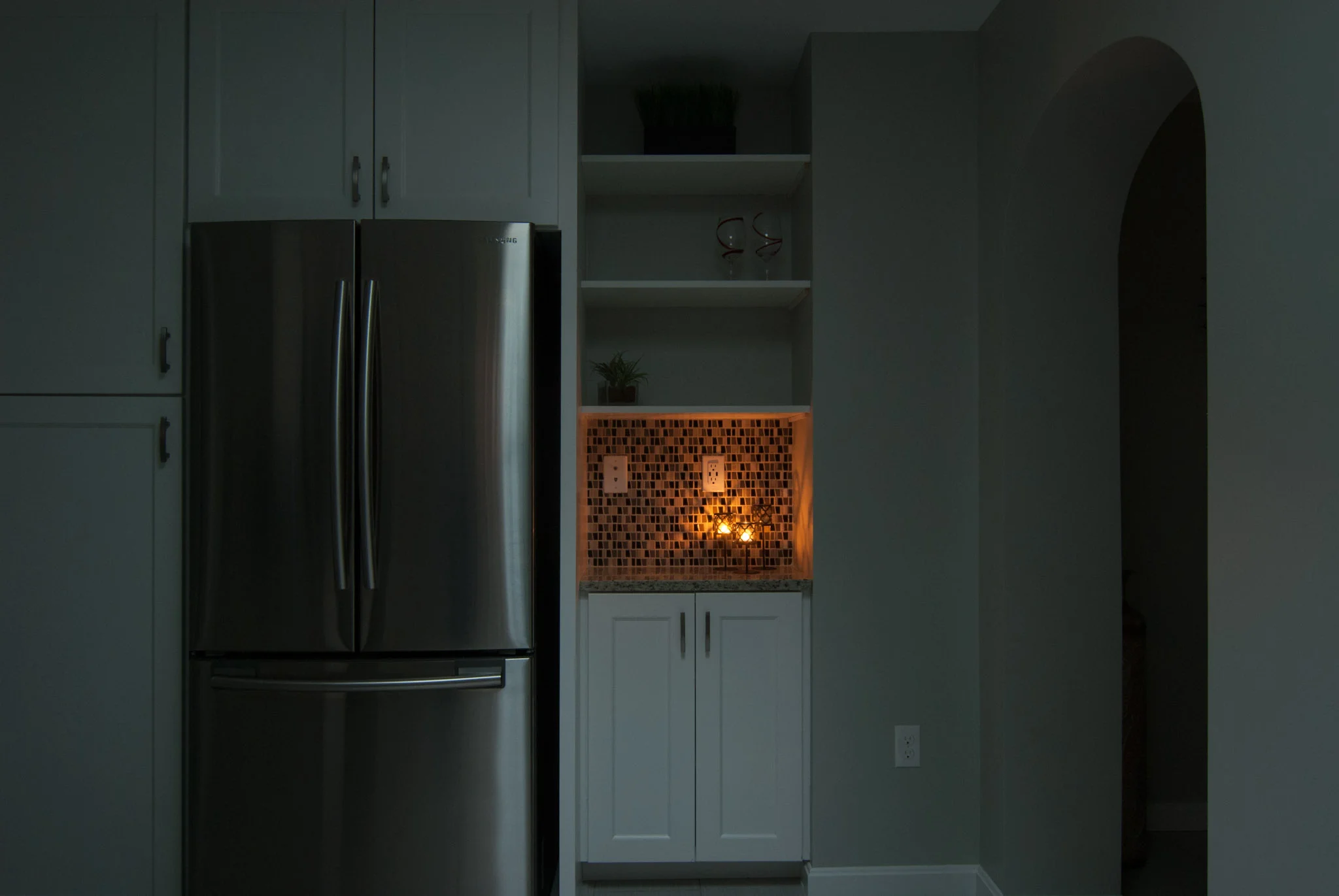 Ambient light only. The third candle didn't like me, so I had to clone in the glow in Photoshop.