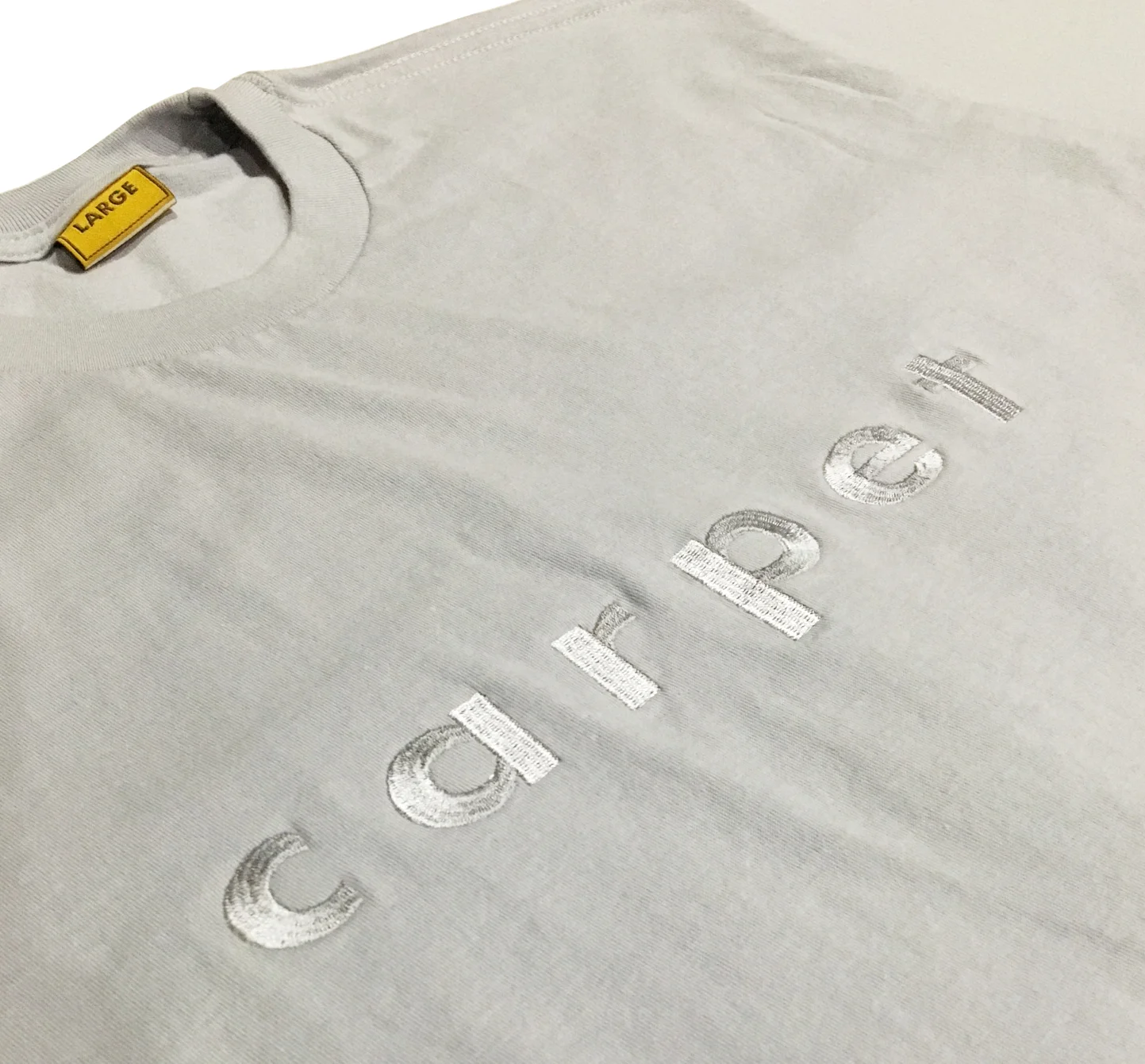 Grey Carpet Embroidered Front Zoom.JPG