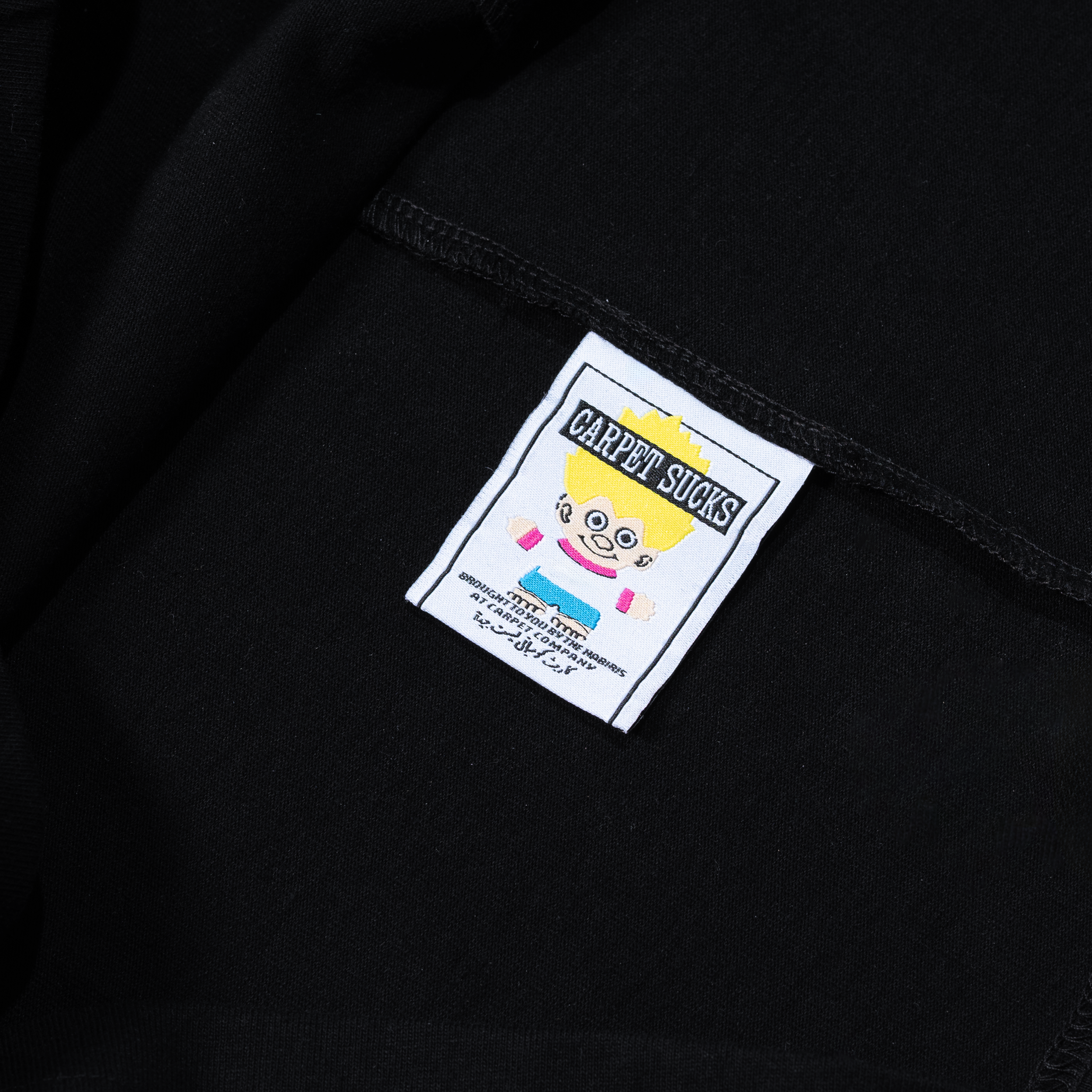 Black T Shirt Tag.png