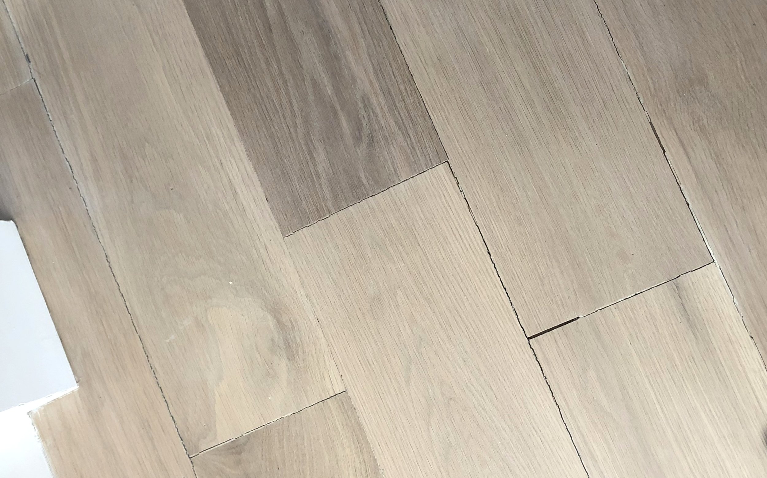 The Floor Board Blog Valenti Flooring, How Do You Fill Gaps In Prefinished Hardwood Floors