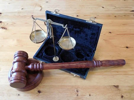 gavel and scales wood desk.jpg
