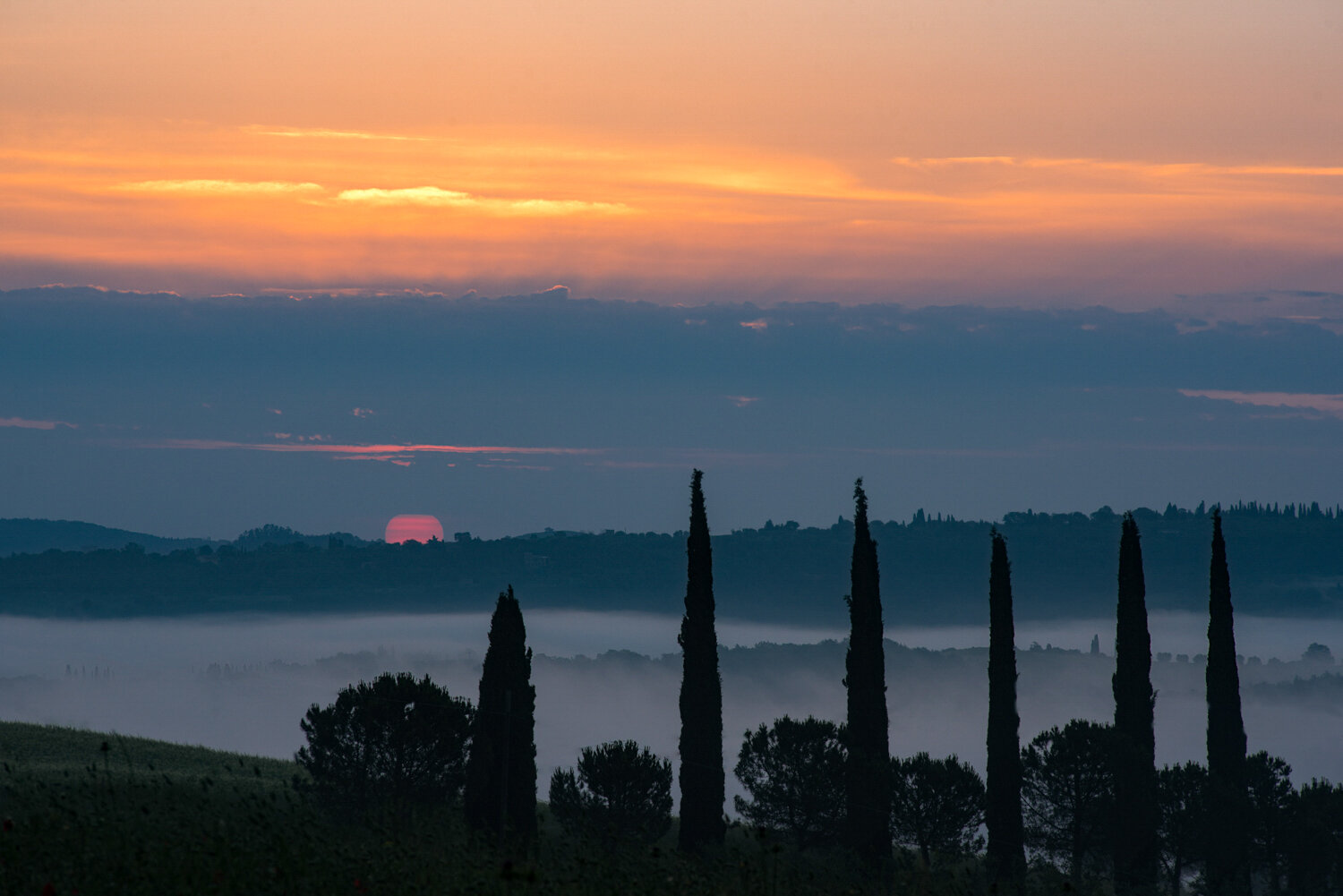 Sunrise at Podere Belvedere Valley PHOTOGRAPHY: MIRKO FIN • Nikon D750 • NIKKOR 70-210 Ƒ/4-5.6 @ 170mm • Ƒ/11 • 1/40 sec • ISO 100