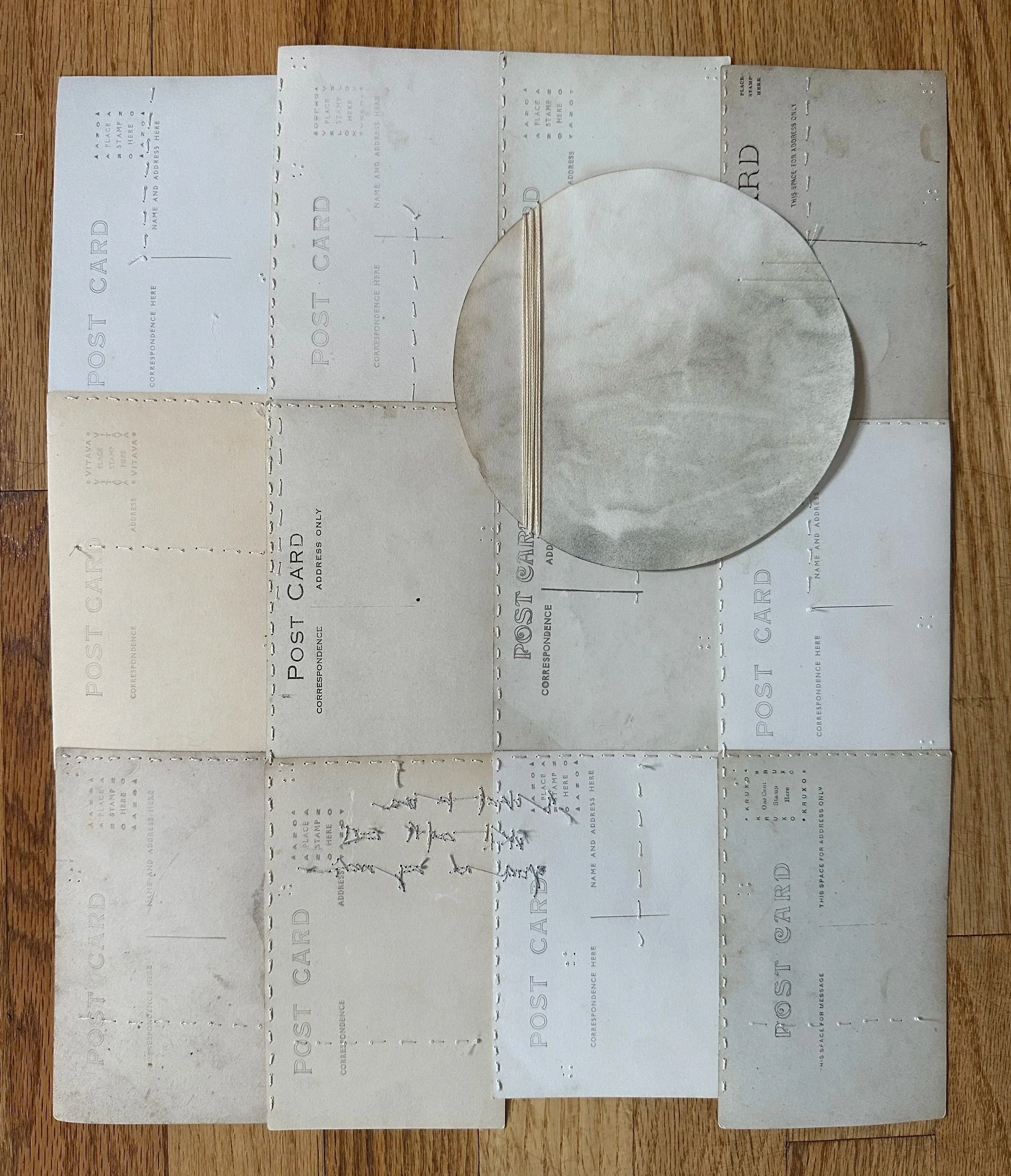 dimly but there - dyed paper and hand embroidery on antique postcards - available through the artist