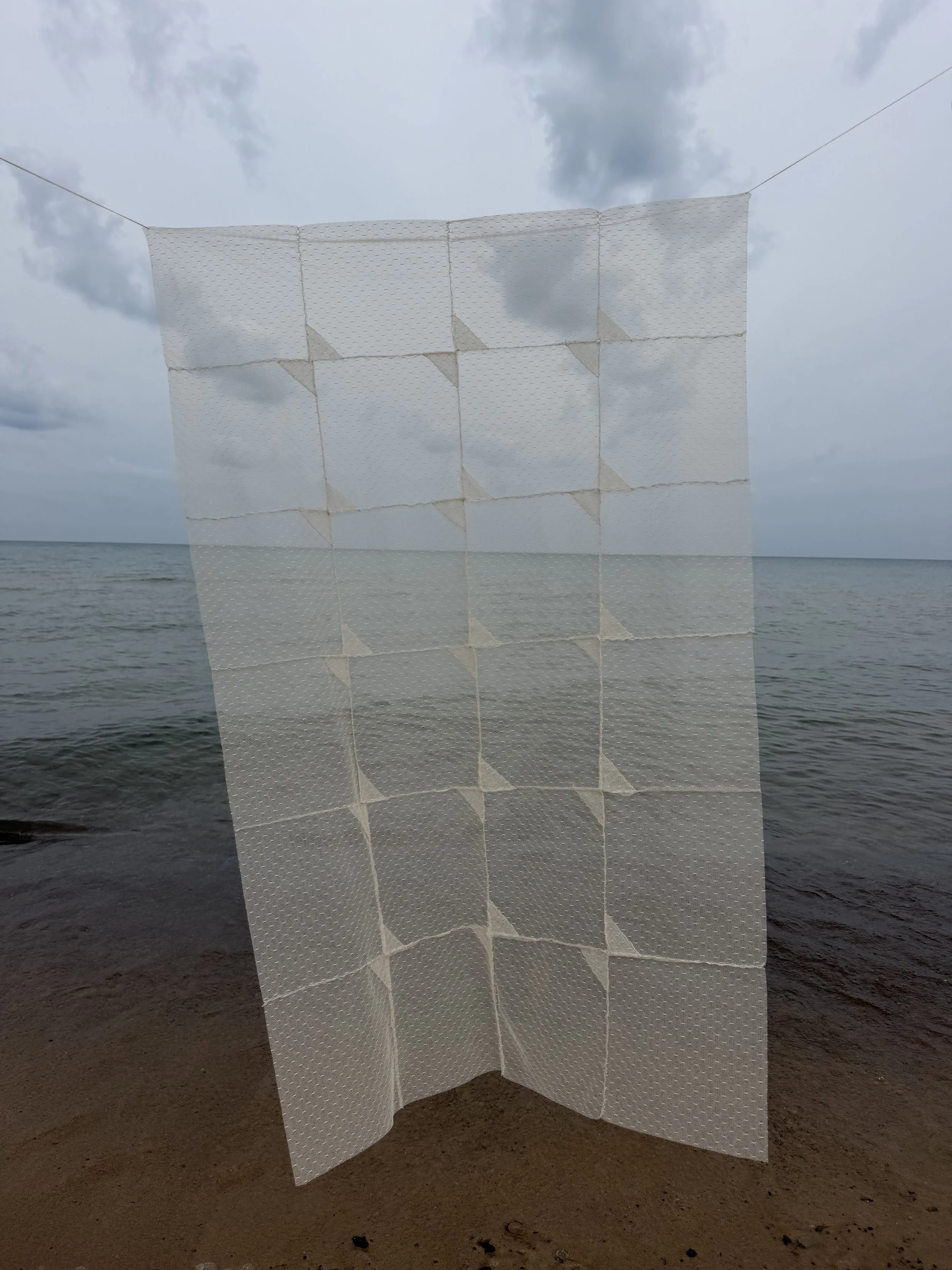 a need to gather fragments - hand stitched fabric - available through the artist