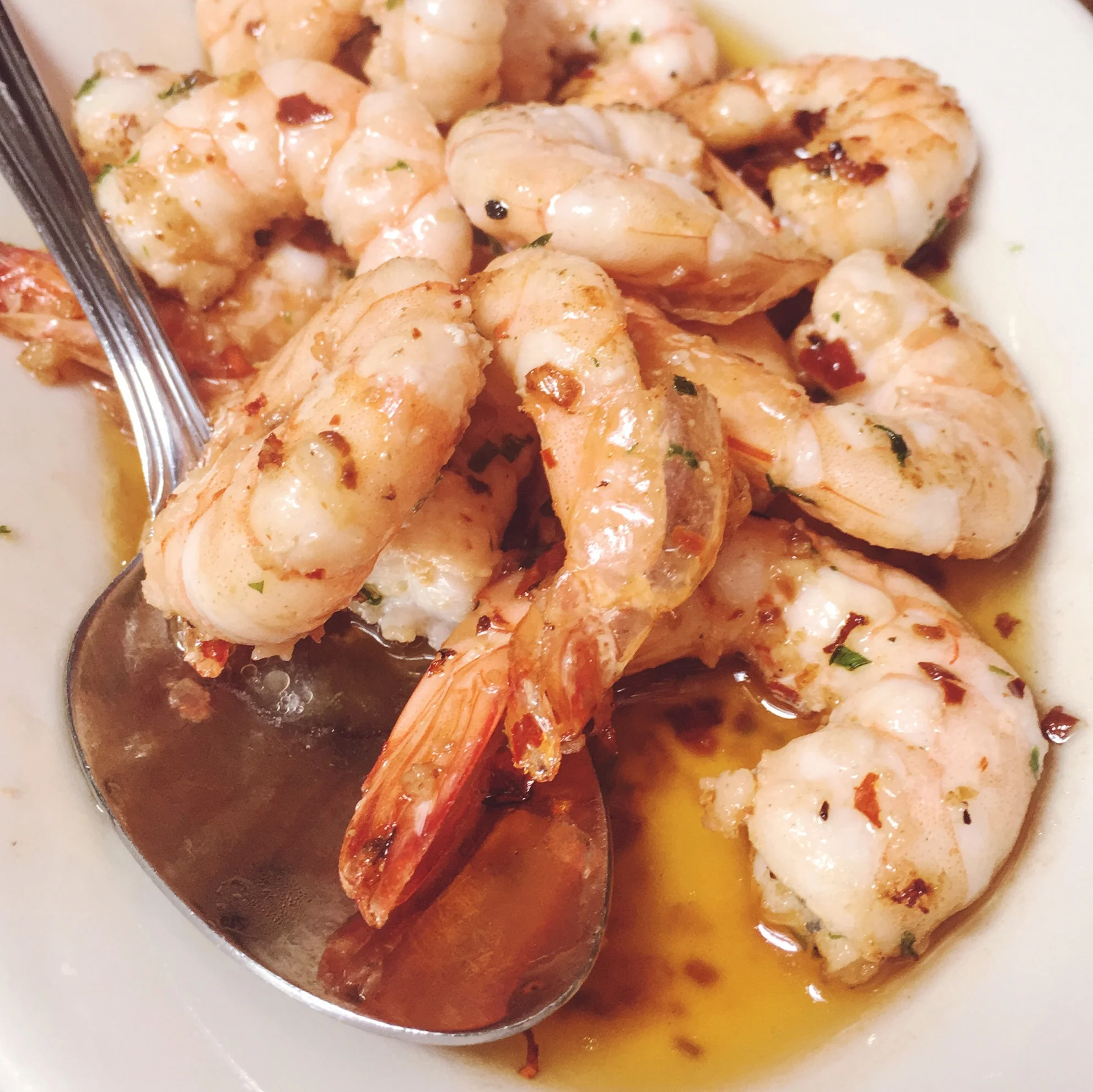 Gambas al Ajillo (Garlic Shrimp) the shrimp, and the buttery sauce it's smothered in really speaks for itself.