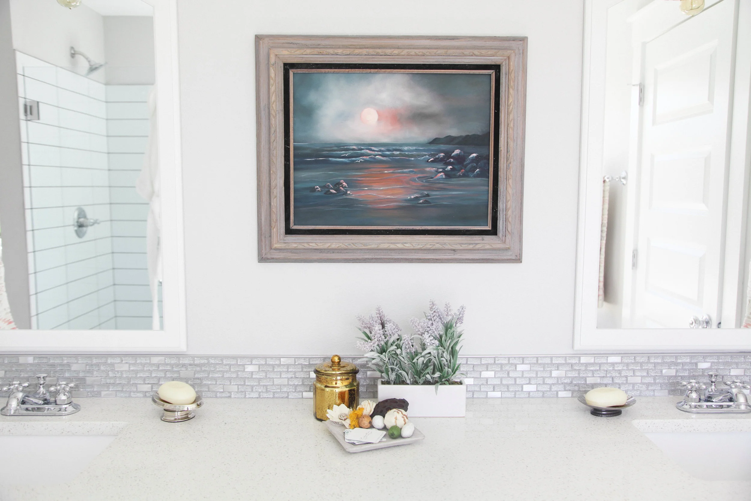 A vintage piece of landscape art looks peaceful and pretty.