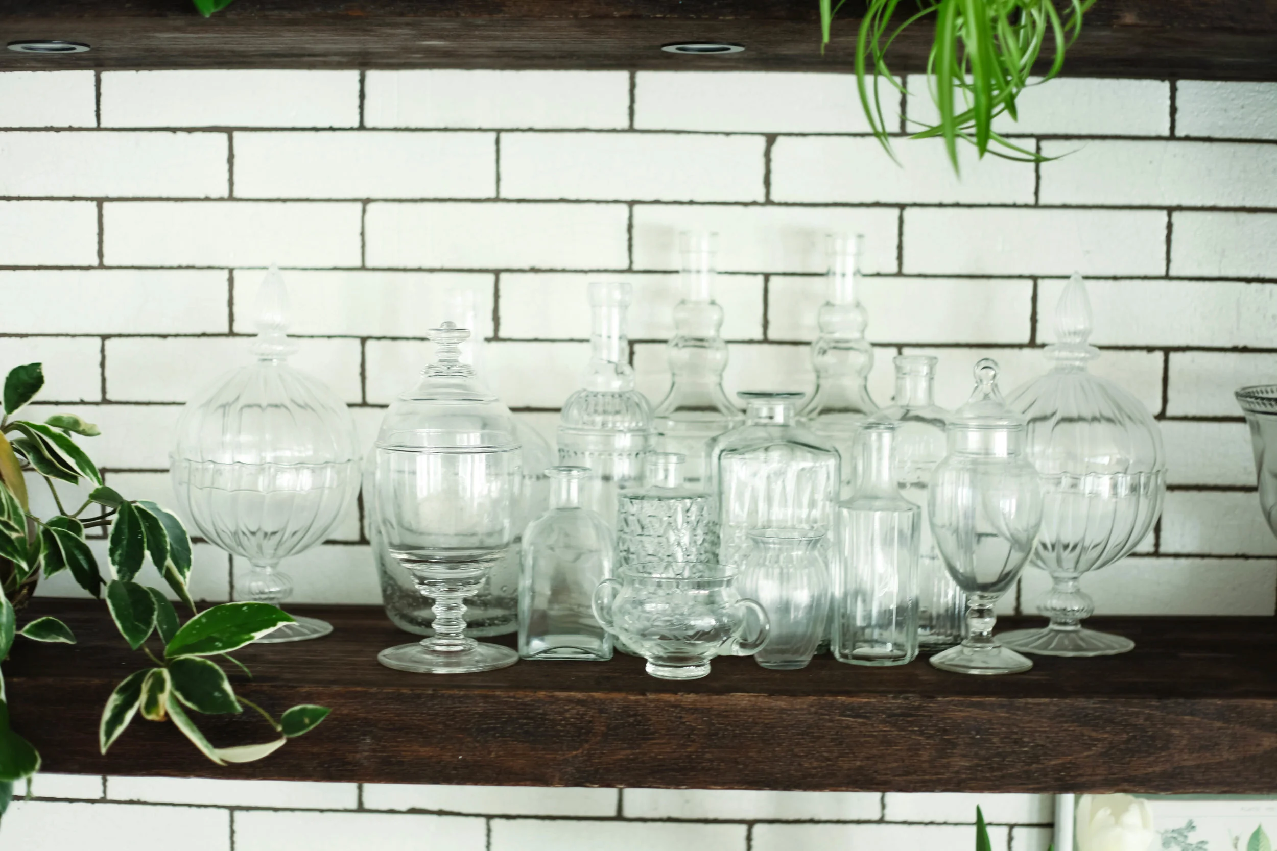 Style tip: Display a pretty collection of vintage glass bottles and vases. This adds delicate, picturesque, character and debt to a shelf.