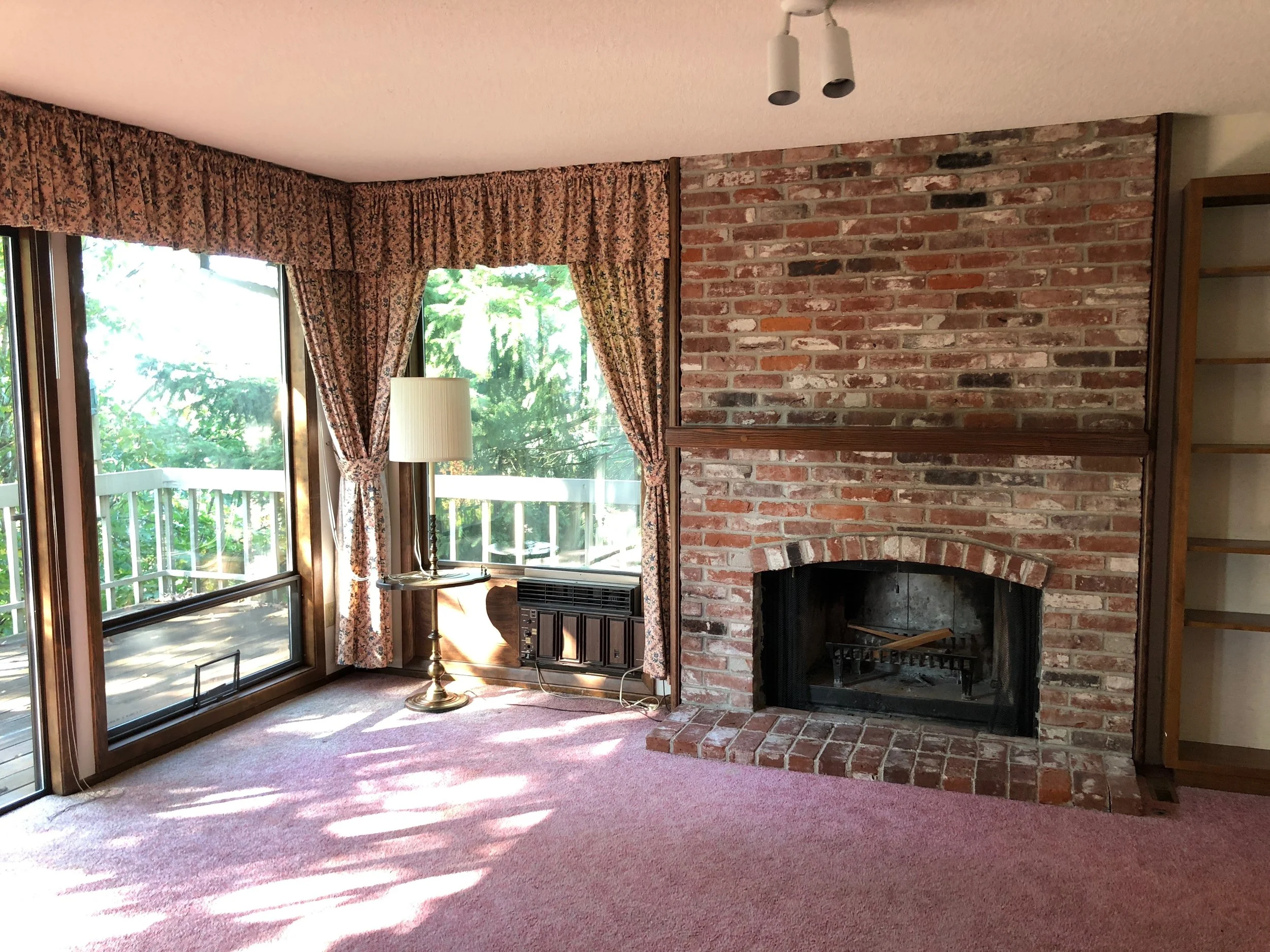 BEFORE // This room had potential! The fireplace was so beaitiful just needed a little touch up.