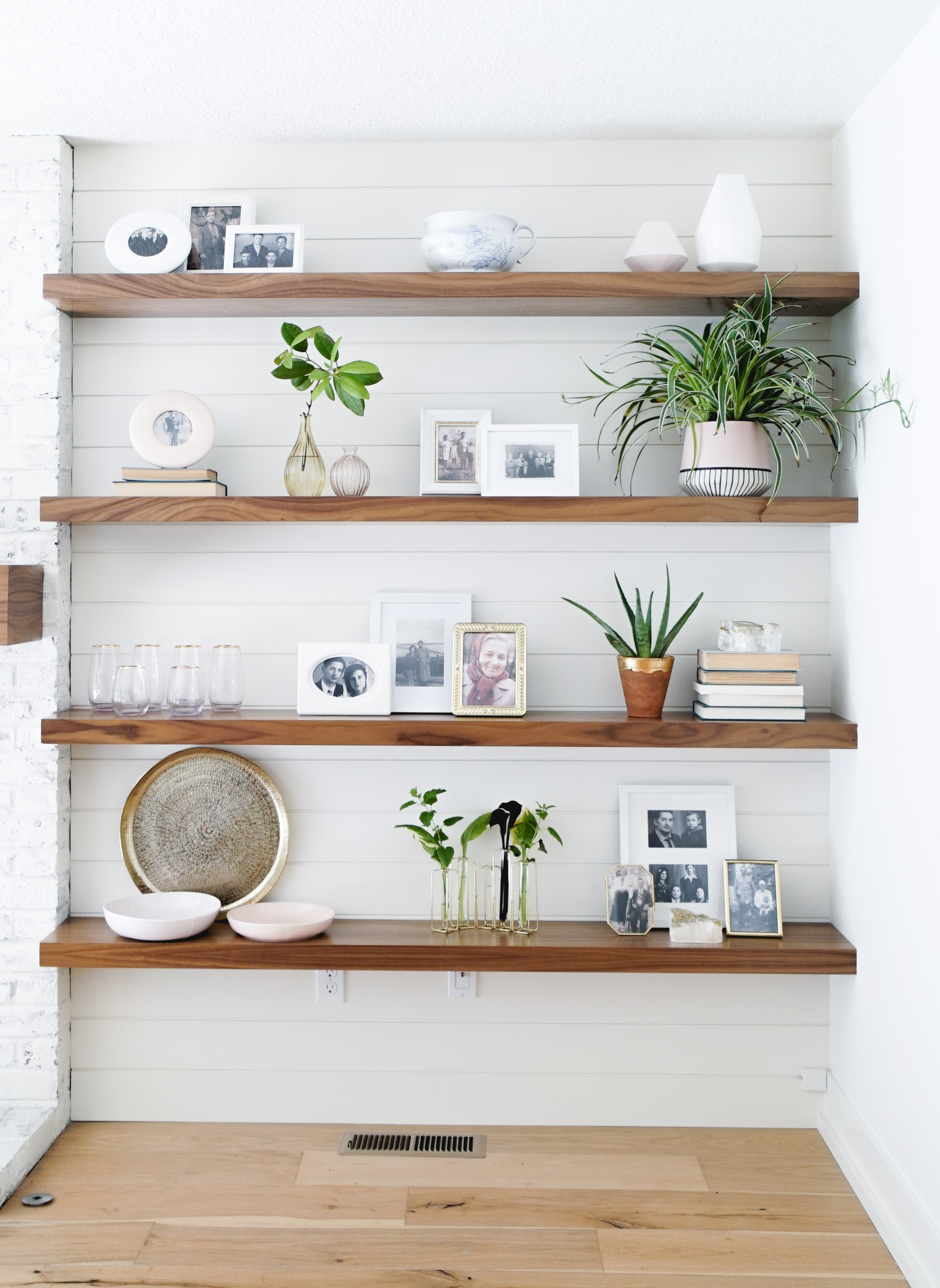 My sweet client, which happens to be my mother in law wanted to incorporate black & white photos of her parents and family on these open shelves. With a few plants and books this shelfie turned out to be so cute!