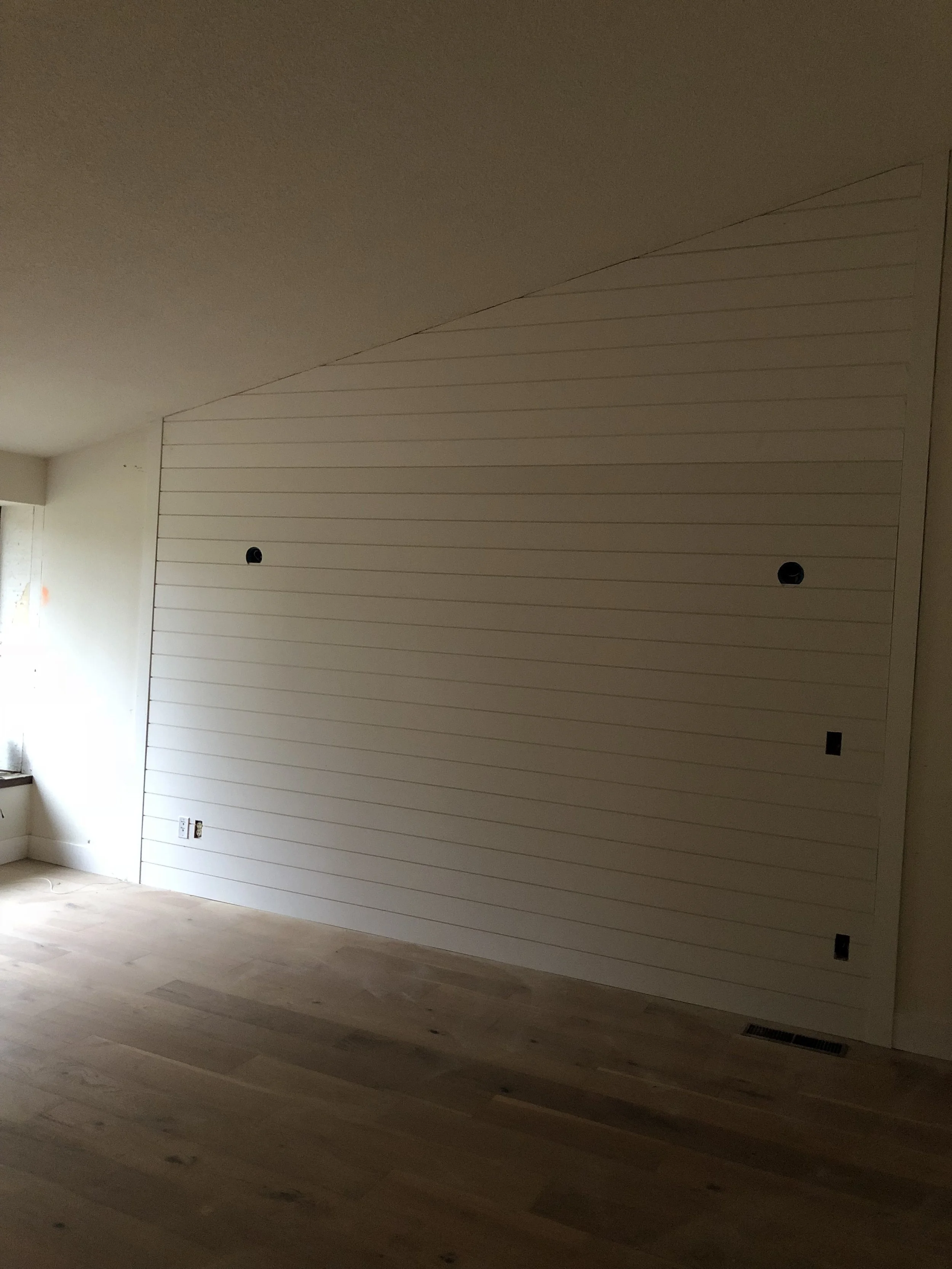 Added hardwoods, shiplap, new paint, wall light fixtures