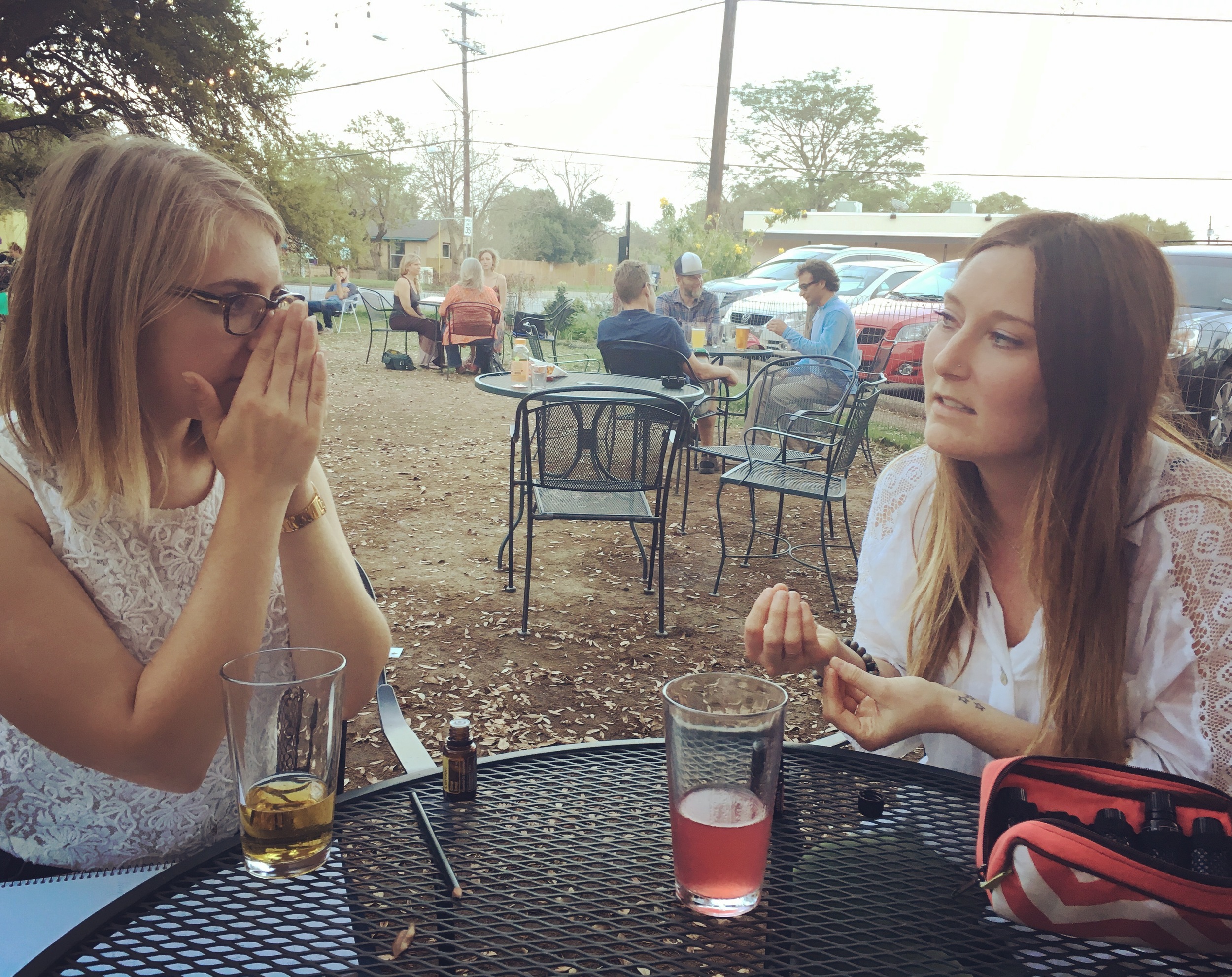 Fool editor Sara Chojnacki and Abigail Hampton smelling passion blend at Radio Cafe.