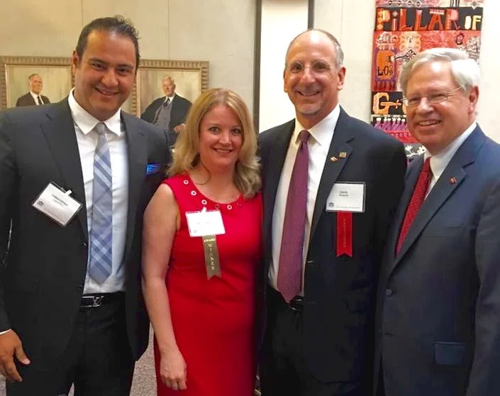 In this photo from left to right: Chris Cabanillas, Wendy Weathers, current New York State Bar Association President David Miranda, and former New York State Bar Association President Stephen Younger.