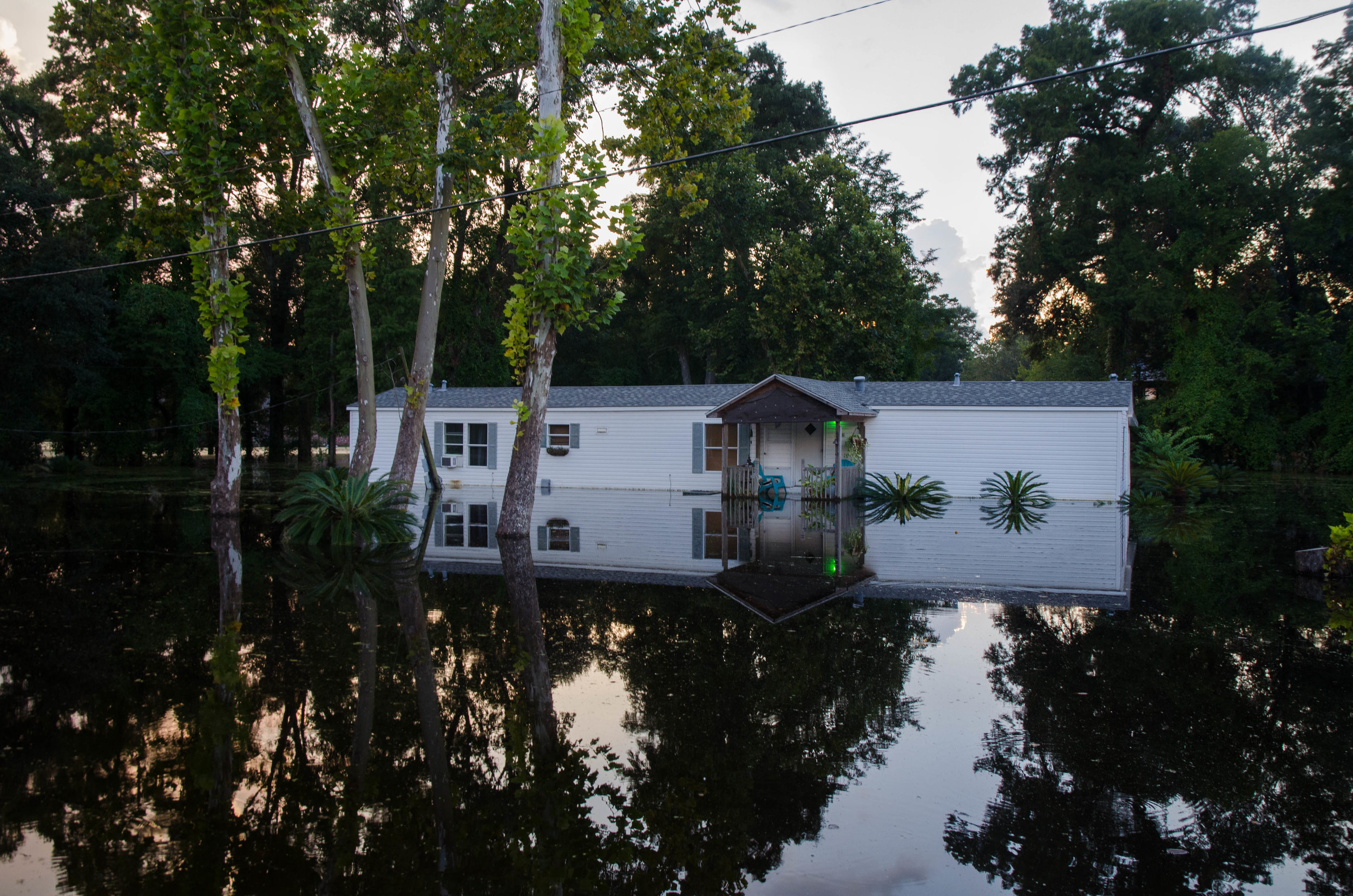  On Bluff Road a house still sits 6 feet underwater, eight days after Baton Rouge flooded. 