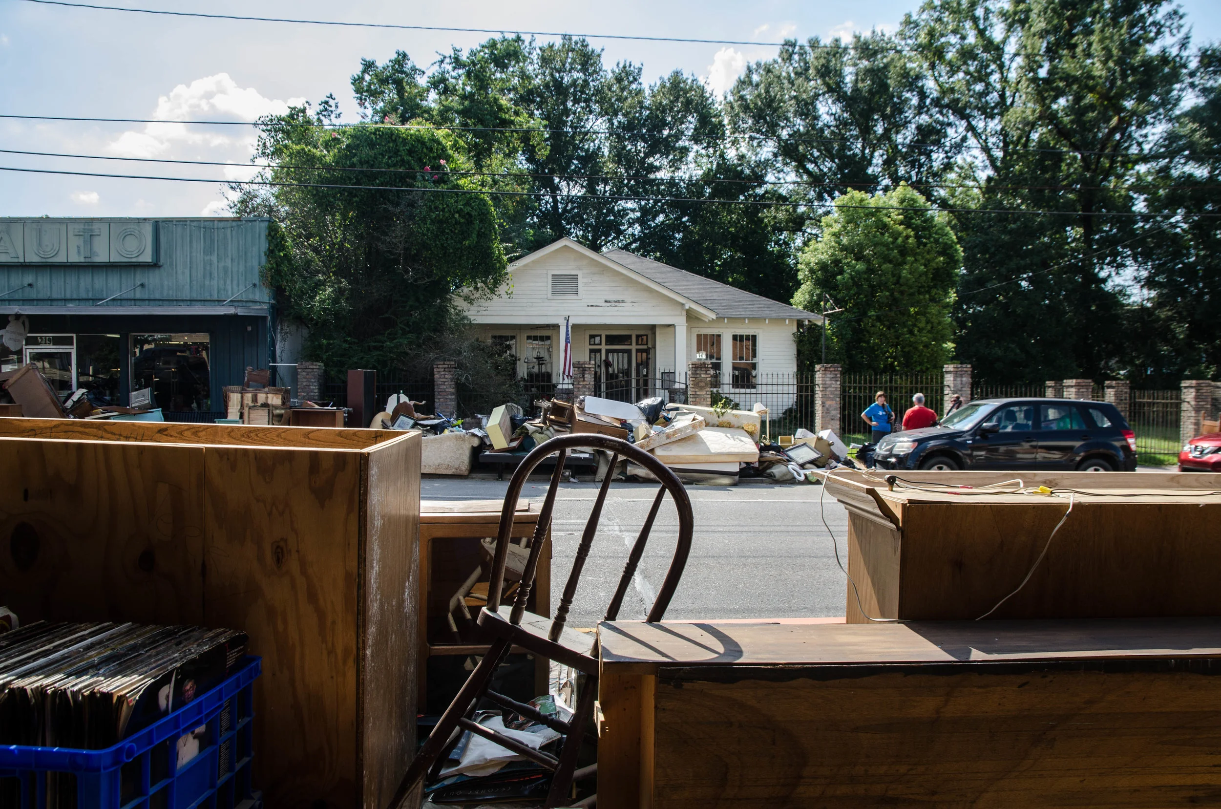 Damaged belongings line the streets in downtown Denham Springs, Louisiana.
