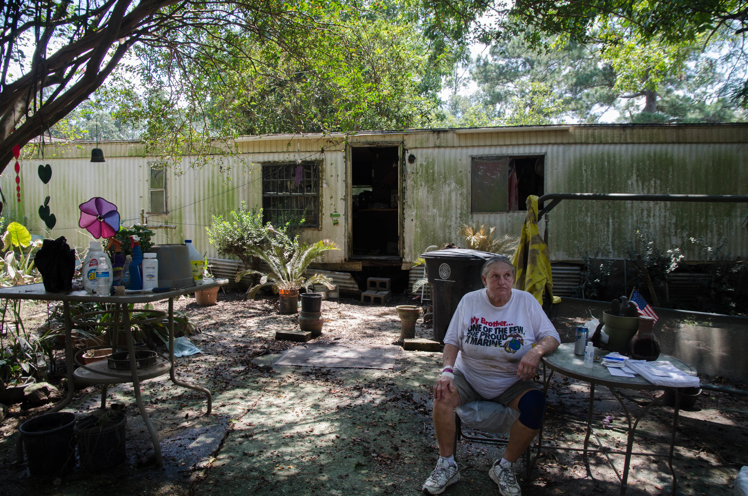  Diane Andrews sits in front of her Baton Rouge home after the flood. 