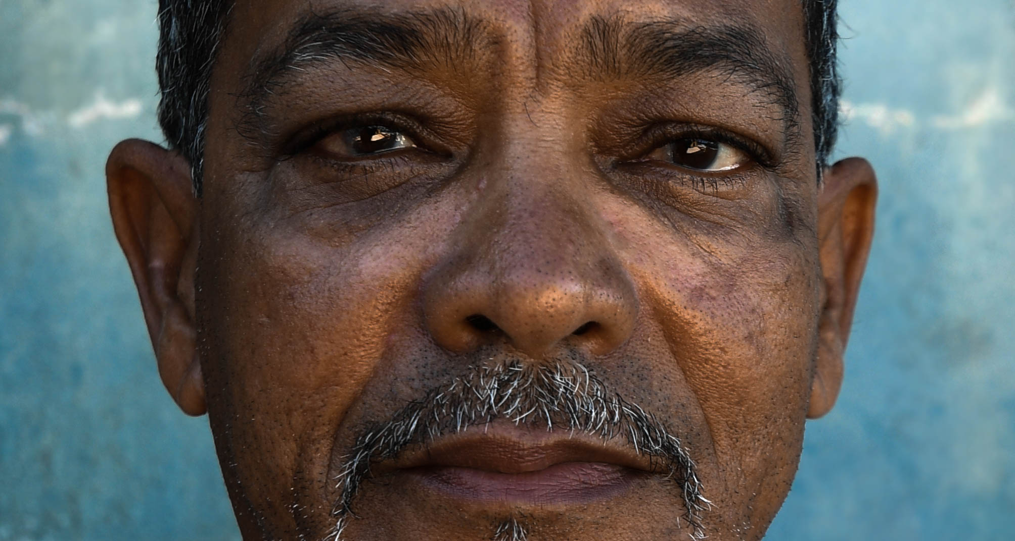  In La Perla near old San Juan, 59-year-old Roberto Caballero's home on the beach has been in his family for 30 years. After Hurricane Irma, Caballera received aid, but three months after Maria, Caballera says he has received nothing. "The government