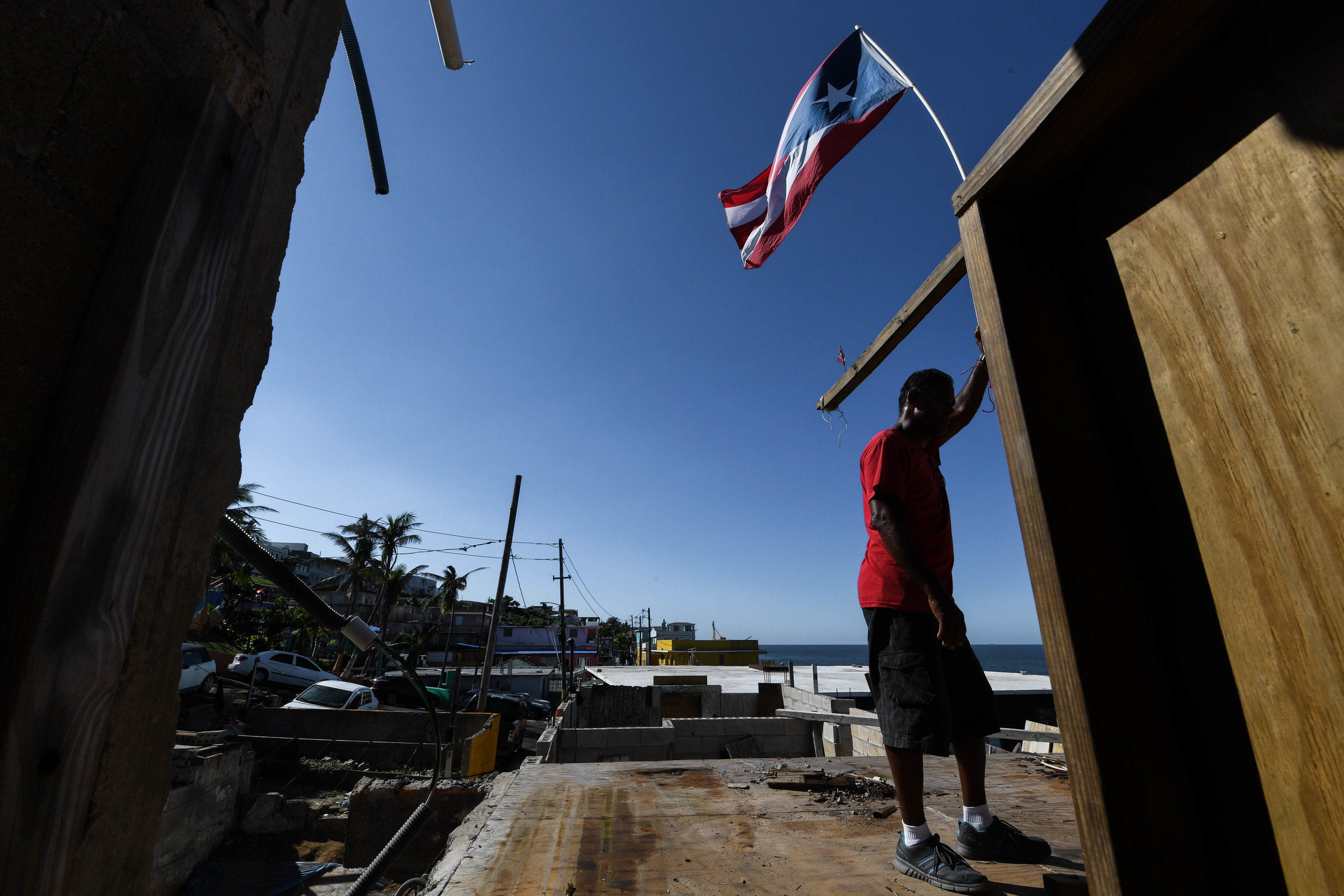  Roberto Virbuet, 55, takes a break from rebuilding his home in La Perla, Puerto Rico. Virbuet is unsure if he can continue living in Puerto Rico after Hurricane Maria. "This is not the Puerto Rico, the one I am living in, this does not feel like hom