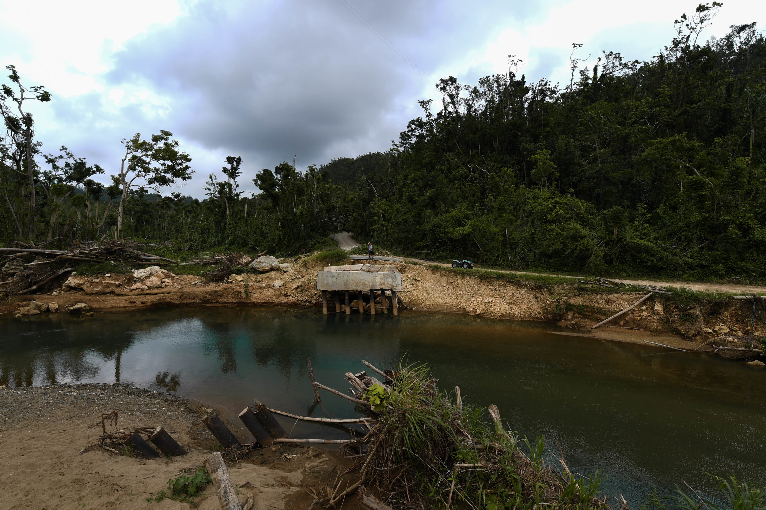  Another downed bridge along the mountain road affects the travel route of the ITDRC team. 