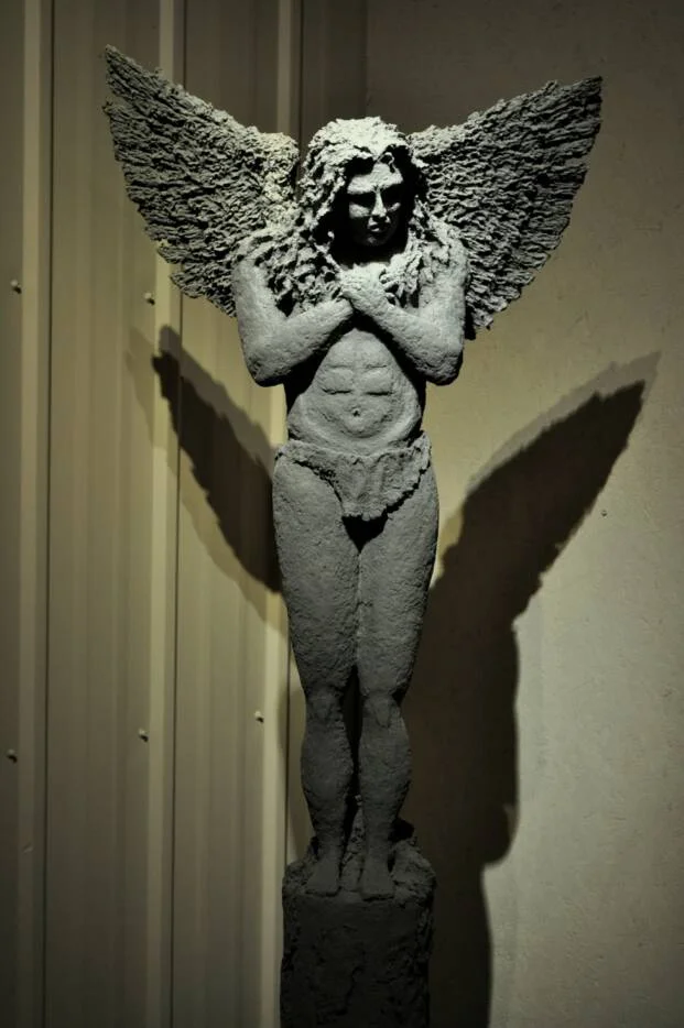   His Heart   Completed 2004  Paper on a stone base  51" x 14" x 23" 