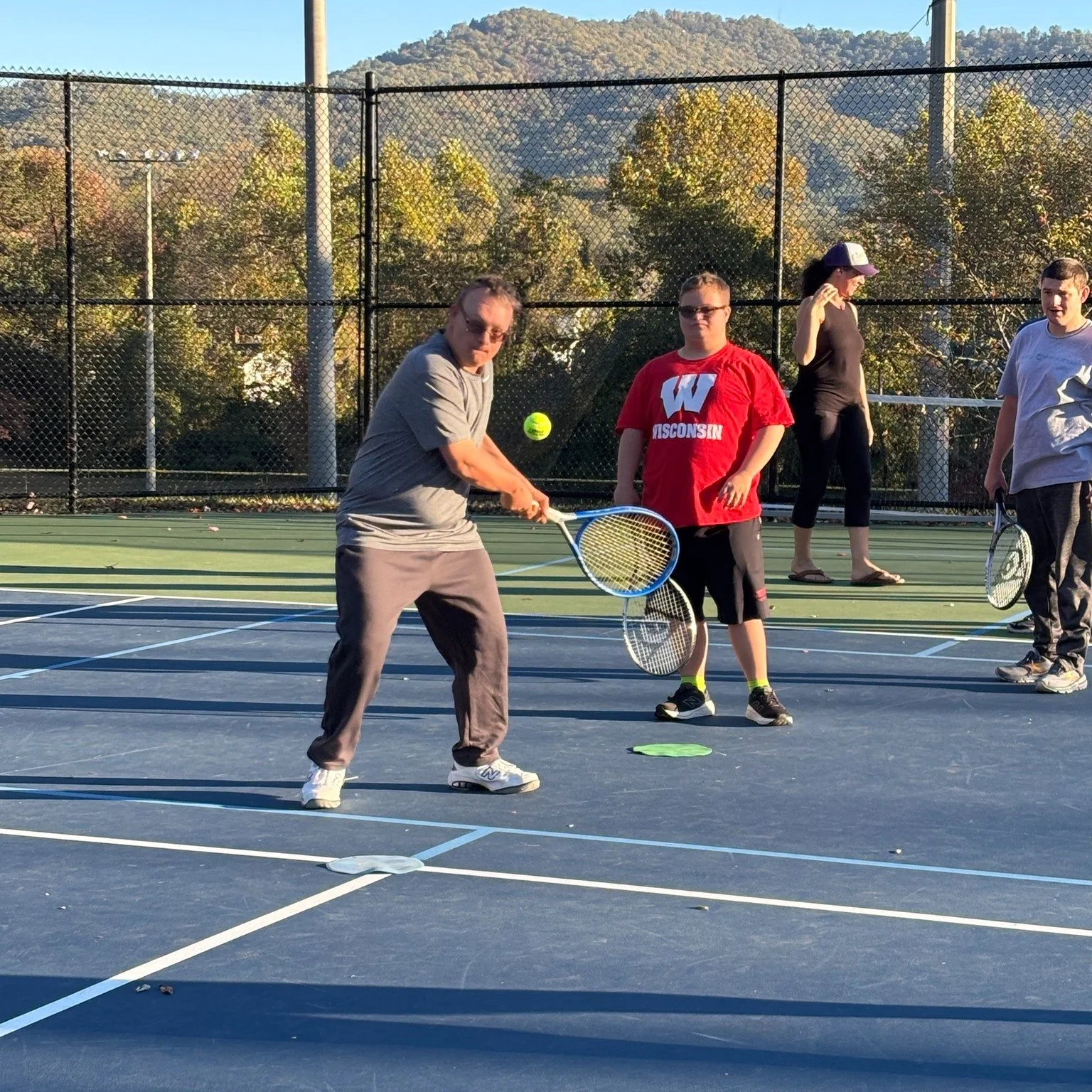 Another beautiful night for Special Olympics last night.  The volunteers and coaches both taught and learned from these athletes.  This Special Olympics team is truly a joy to work with.  @ustanorthcarolina @abilitiestennisnc @ashevilleparksandrecrea