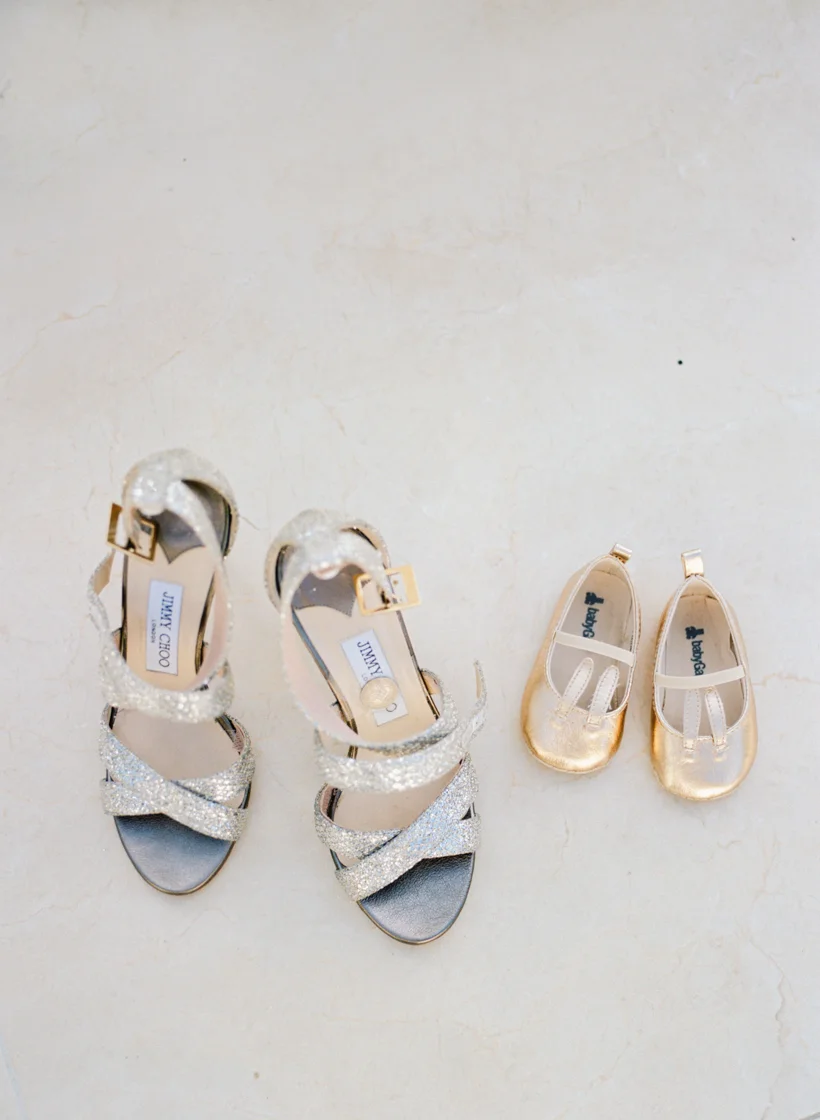 The bride's Jimmy Choo heels and the flower girl's gold bunny shoes from The Gap - photo by Kat Braman