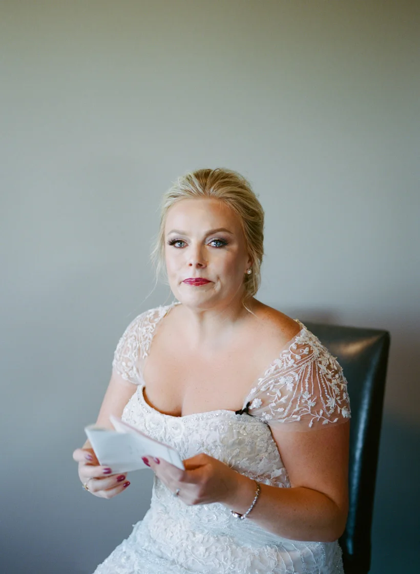Bride in Monique Lhuillier wedding dress at Eritage Resort- photo by Kat Braman