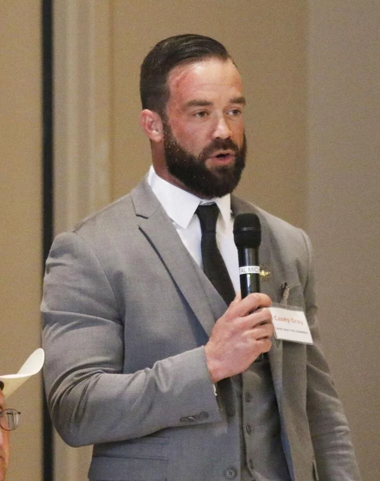 Casey Gray speaking at recent forum