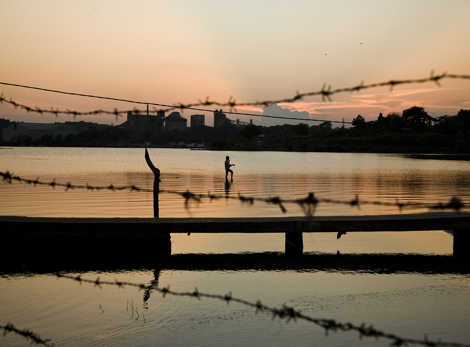 A man fishes at dusk in east Sri Lanka. The area is recovering from civil war and the devastation of the tsunami. Feature for Morgenbladet