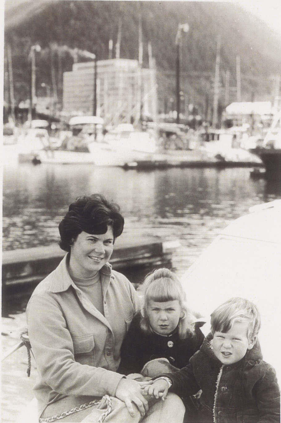 Sheila with Heather and Scott (ages 4 and 2, respectively) aboard the F/V Brandt , about to head down to the cabins at Taku Harbor while Pete goes out fishing.