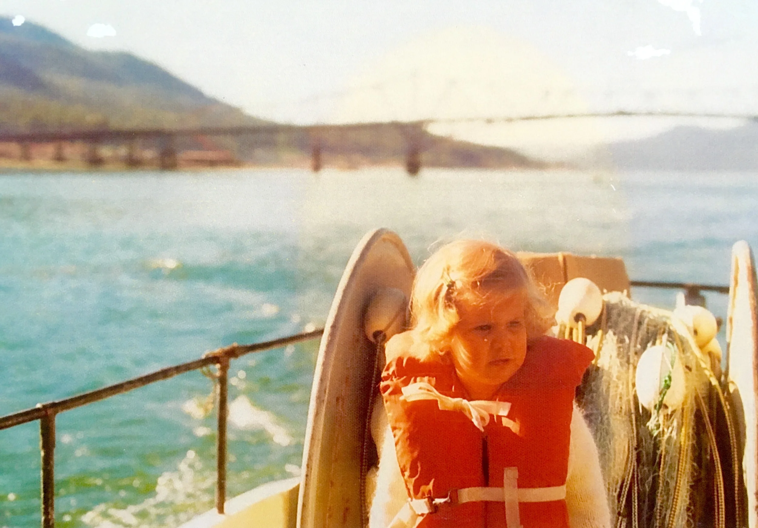 Heather (age 2) en route to the Taku Inlet fishing grounds with her father Pete.