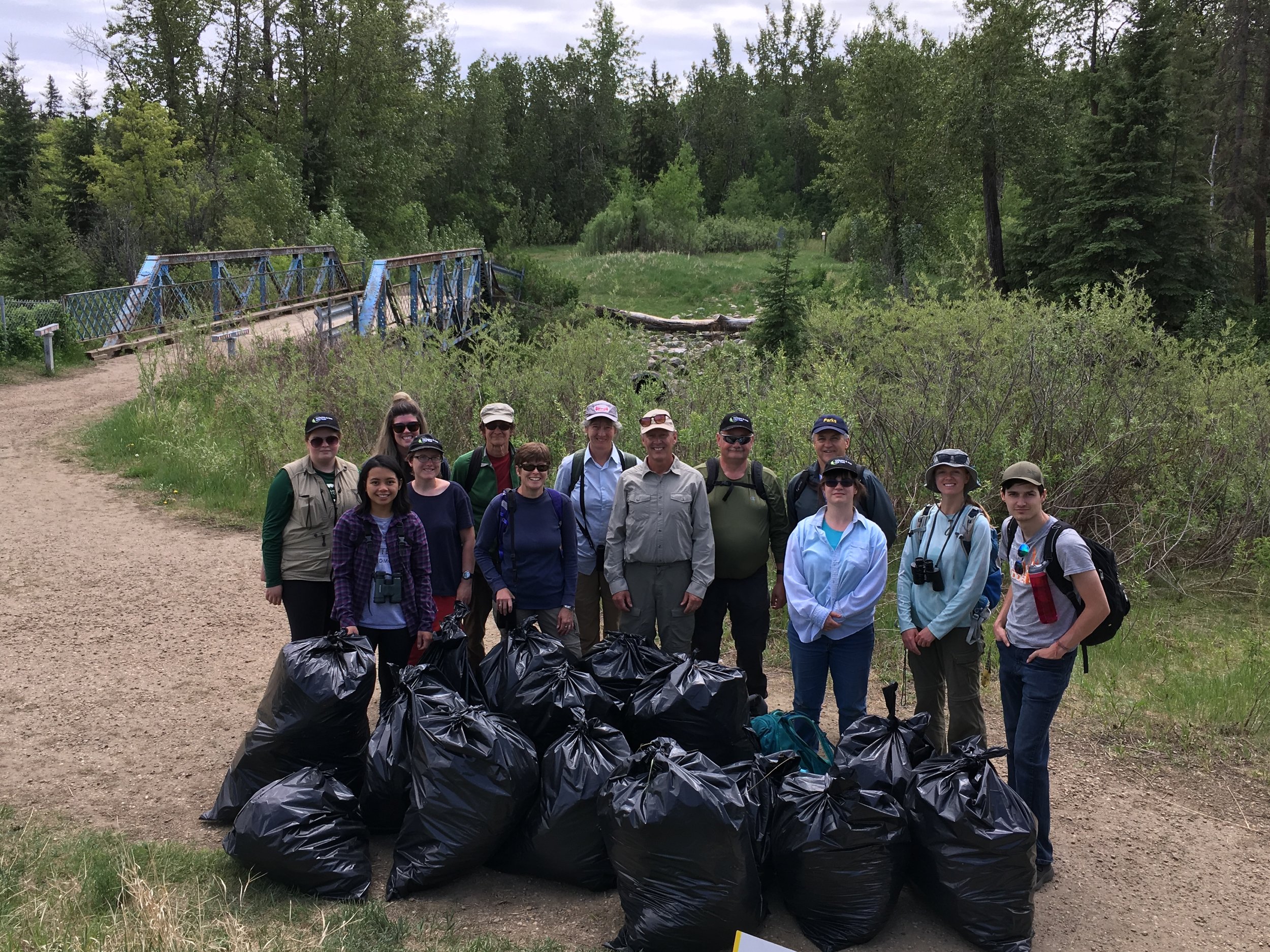 Volunteers remove 15 bags of invasive Leafy Spurge from Larch Sanctuary