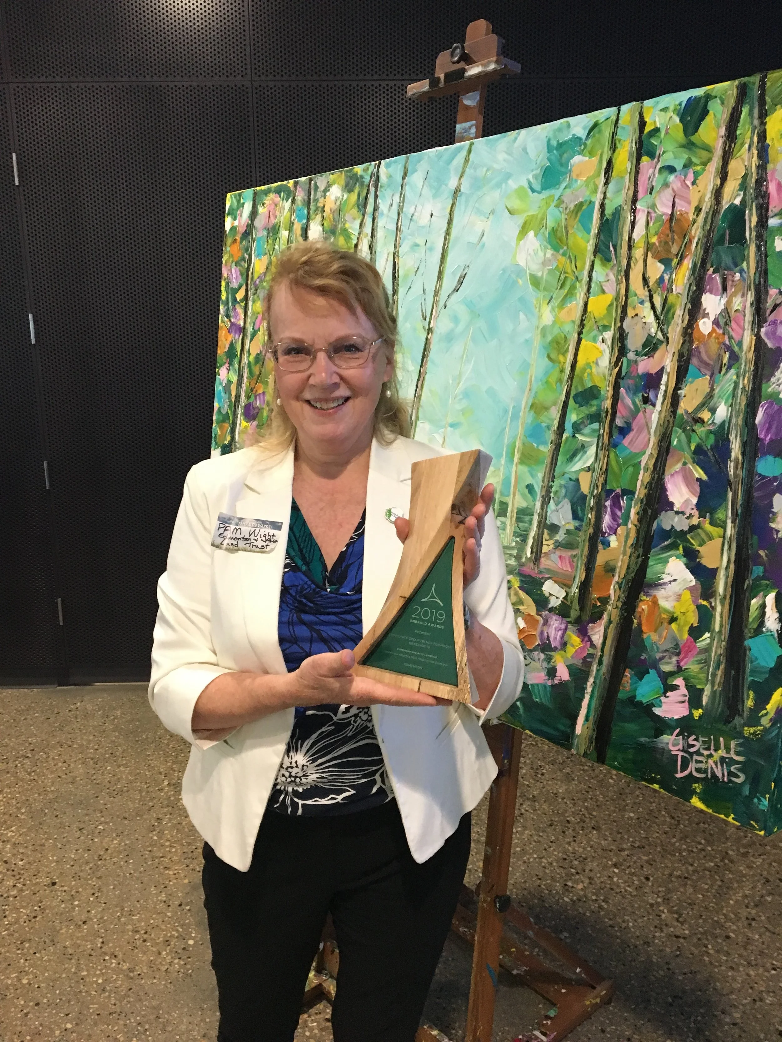 Pam holding EALT’s second Alberta Emerald Foundation Award
