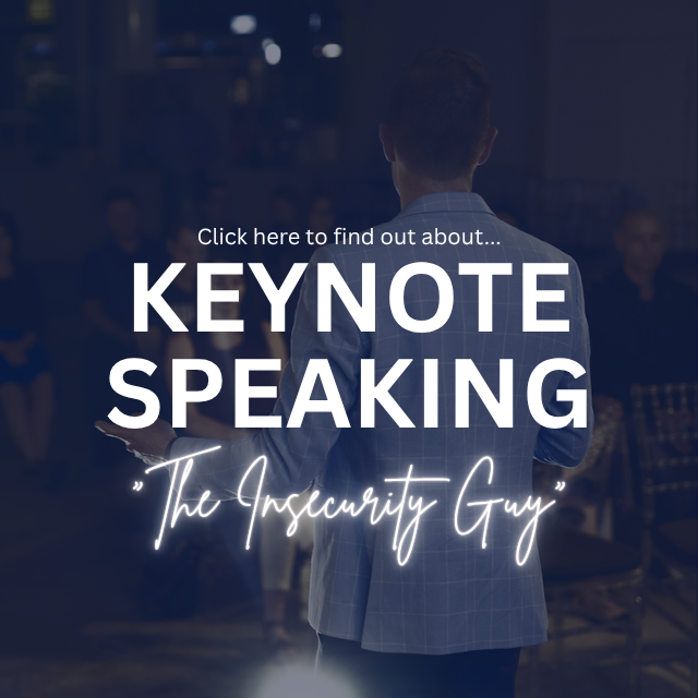 Promotional image for keynote speaking event featuring The Insecurity Guy, with a person in a suit holding a phone in a dark room.