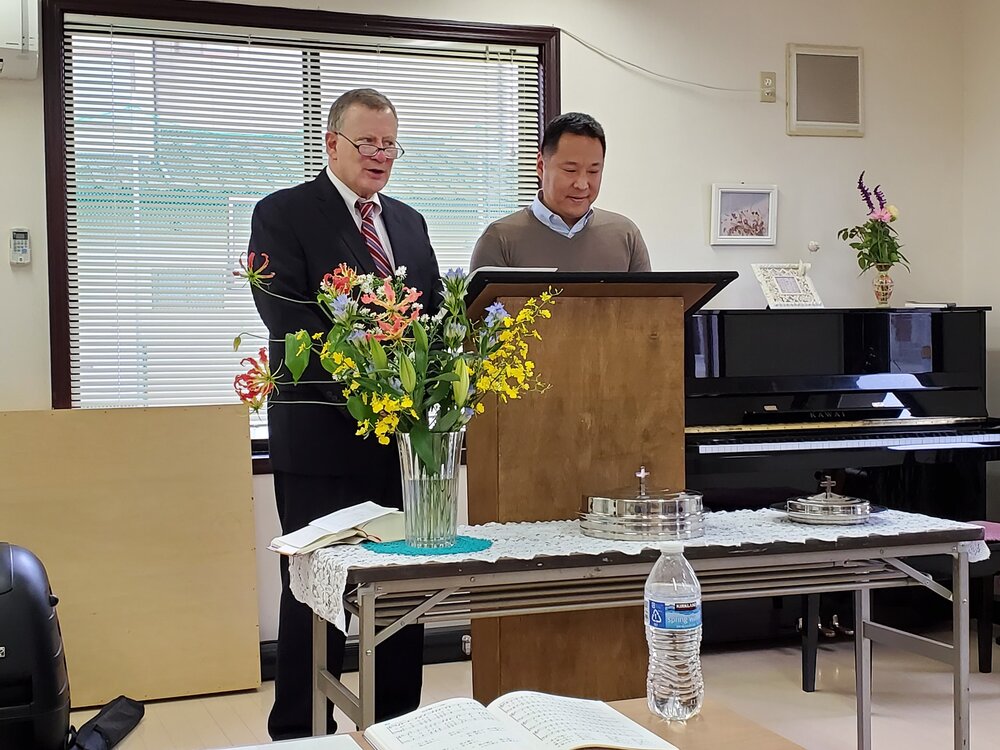 Woody translating for Pastor Sam Kim.jpg