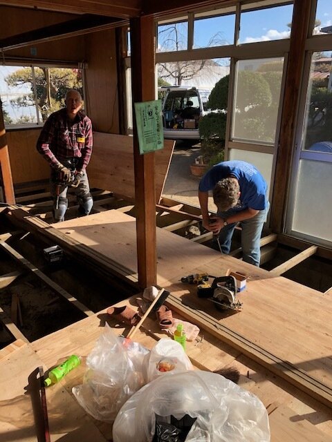 Mark Palmer and Woody replacing the floor.jpg