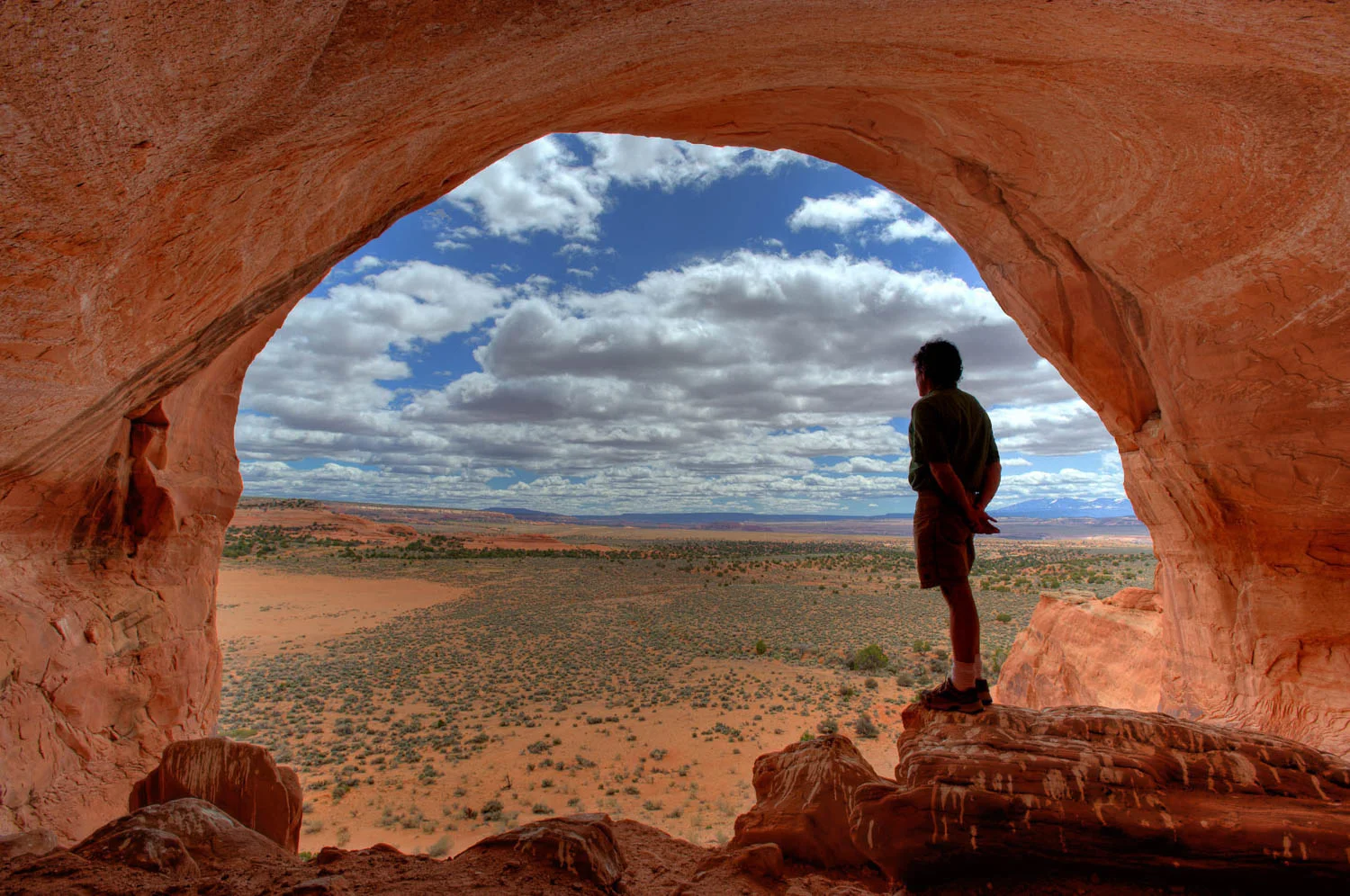 Man Enjoying the view from Looking House Rock, near Moab, Utah