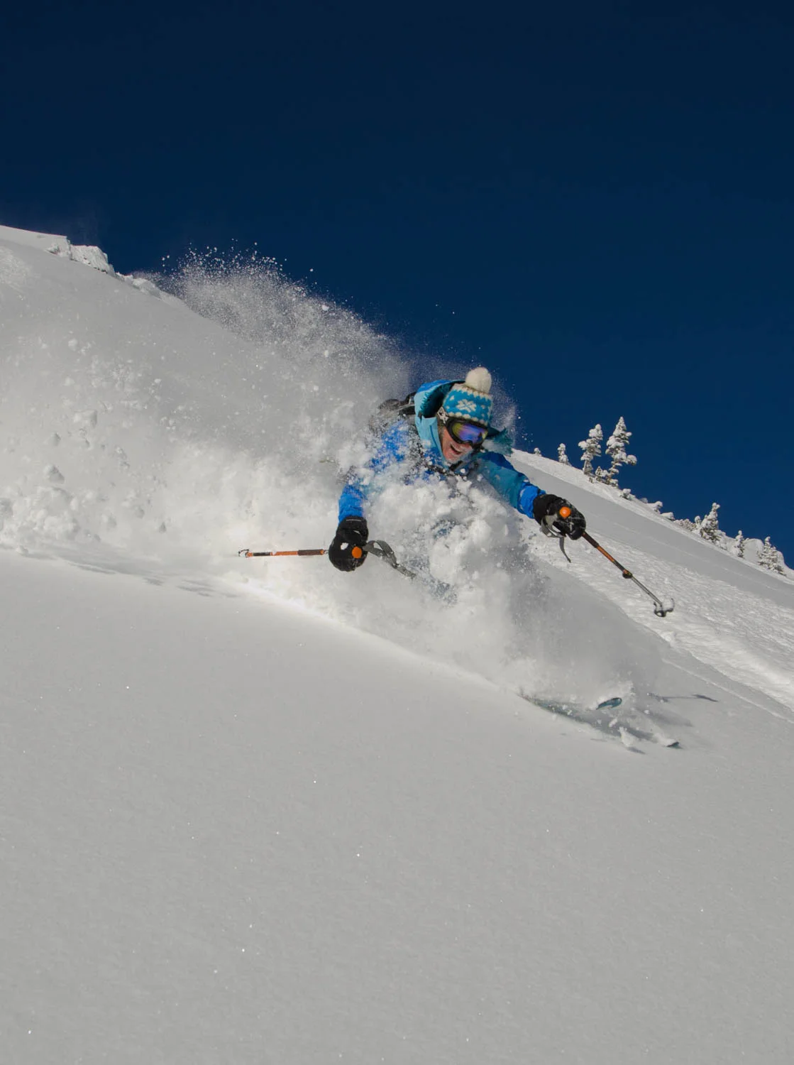 Woman Powder Skiing in Day's Fork, Big Cottonwood Canyon, Wasatch Mountains, Utah