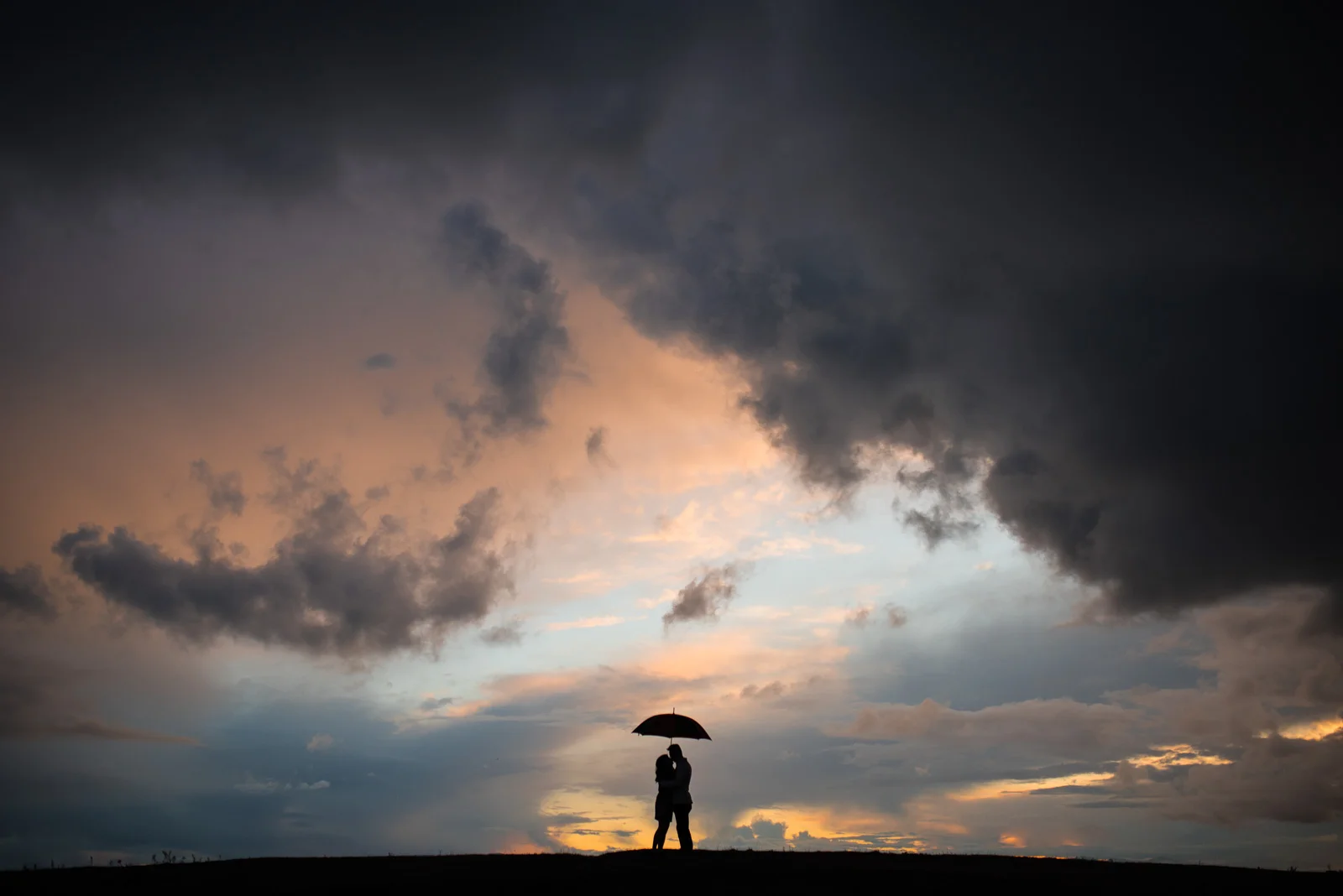 ^ The clouds and rain chased us throughout this engagement shoot for the better part of two hours! Charlene and Josh were troopers though, and it’s a good thing because their patience and determination culminated in this image near the end of the shoot.
