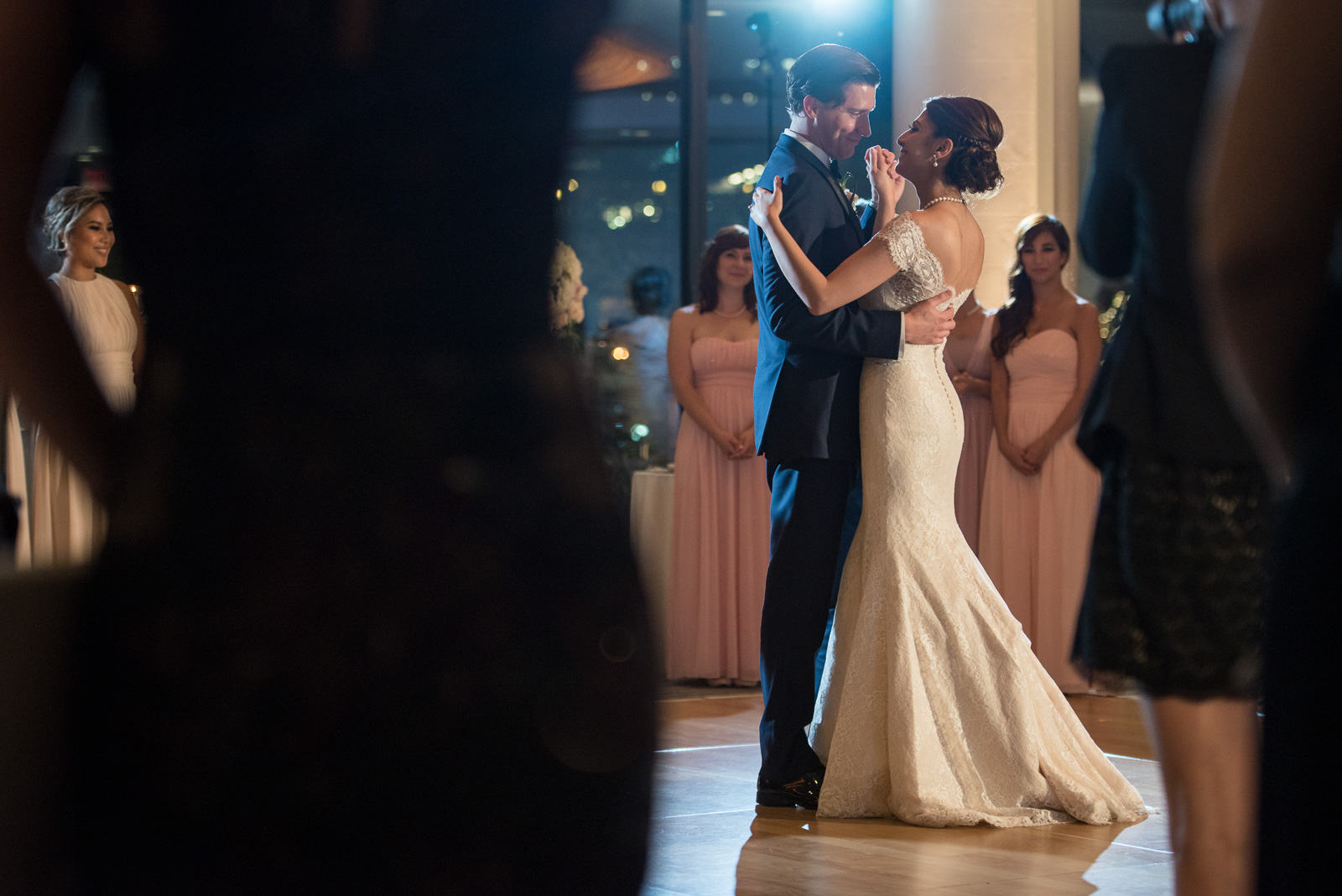  ^ One of my challenges for myself this year was finding more unique and interesting angles on the “first dance” part of the night. &nbsp;For this image at Pegah and Kyle’s wedding, I was shooting from behind the guests who were watching them enjoy t