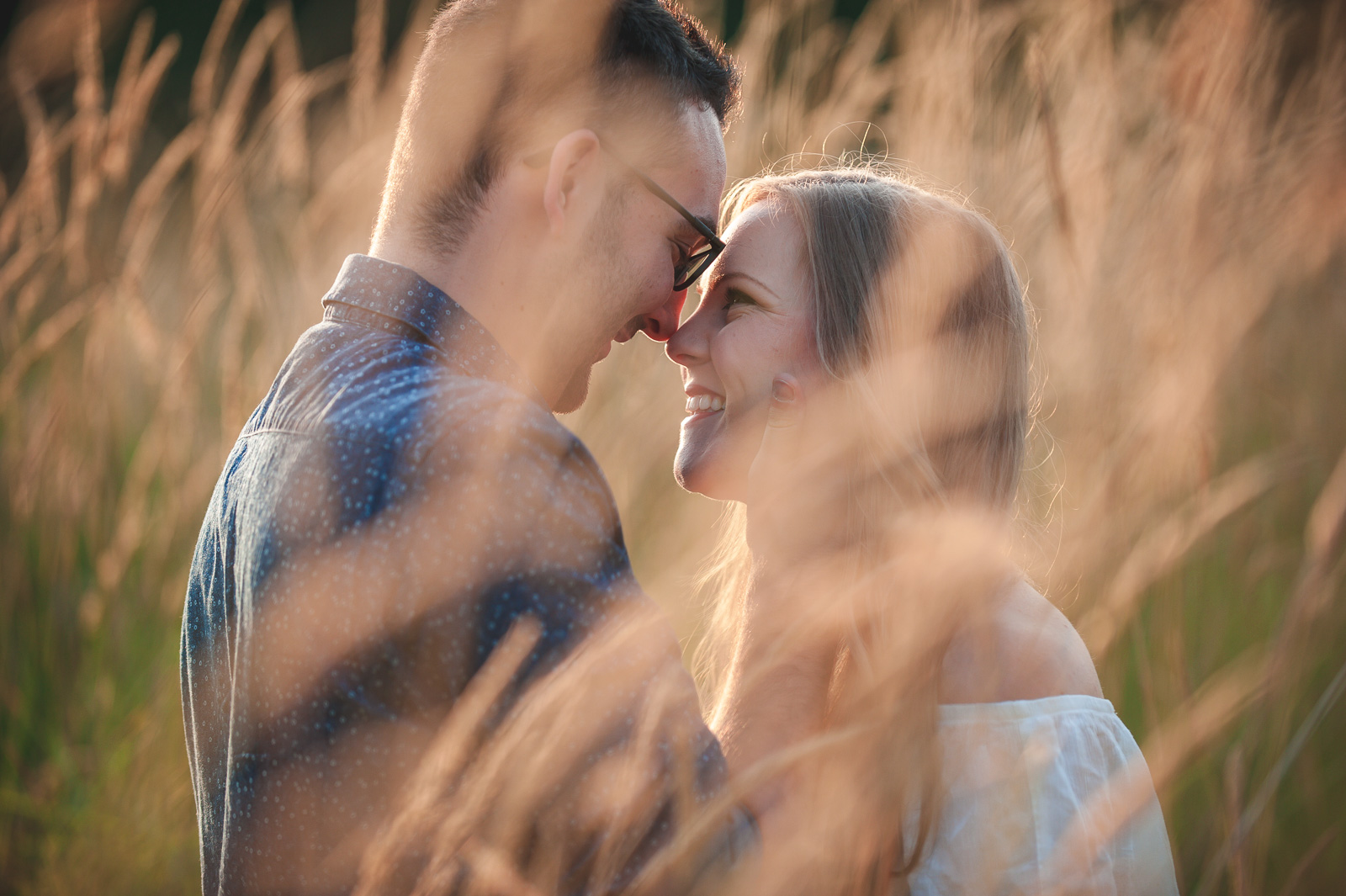  ^ “The moments between.” I love this smiling shot of Halyna and Jason during their engagement session because it’s so natural. &nbsp;When we work with couples, it’s often their first time with a professional photographer. &nbsp;They almost always as