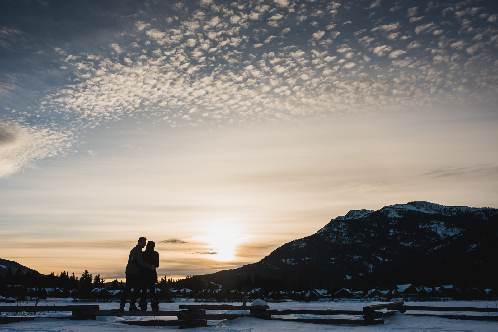couple watching sunset over green lake in whistler bc - vancouver island wedding photographers