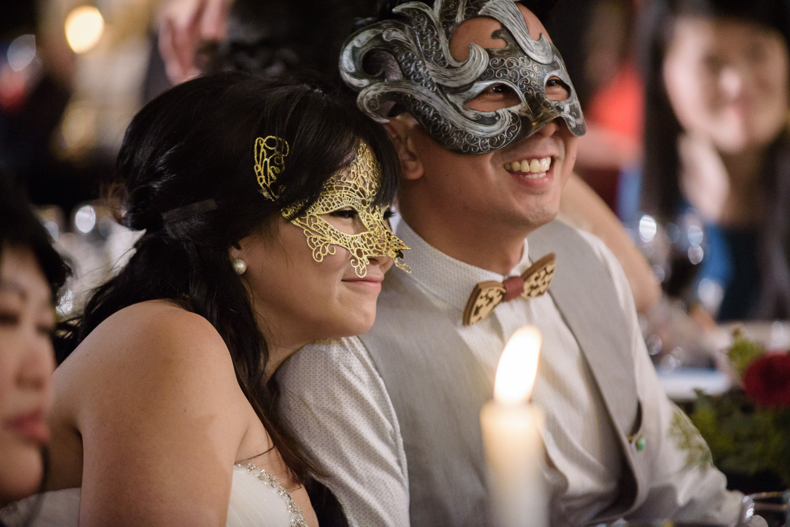 wedding couple smiling at masquerade wedding at ubc boathouse in richmond bc - victoria wedding photographer