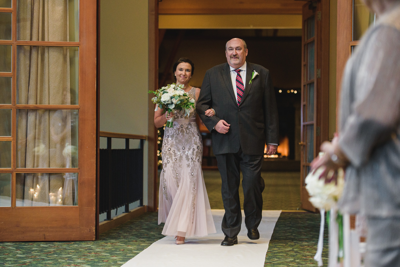 bride entering wedding ceremony at Westwood Plateau - Vancouver Island Wedding Photographers