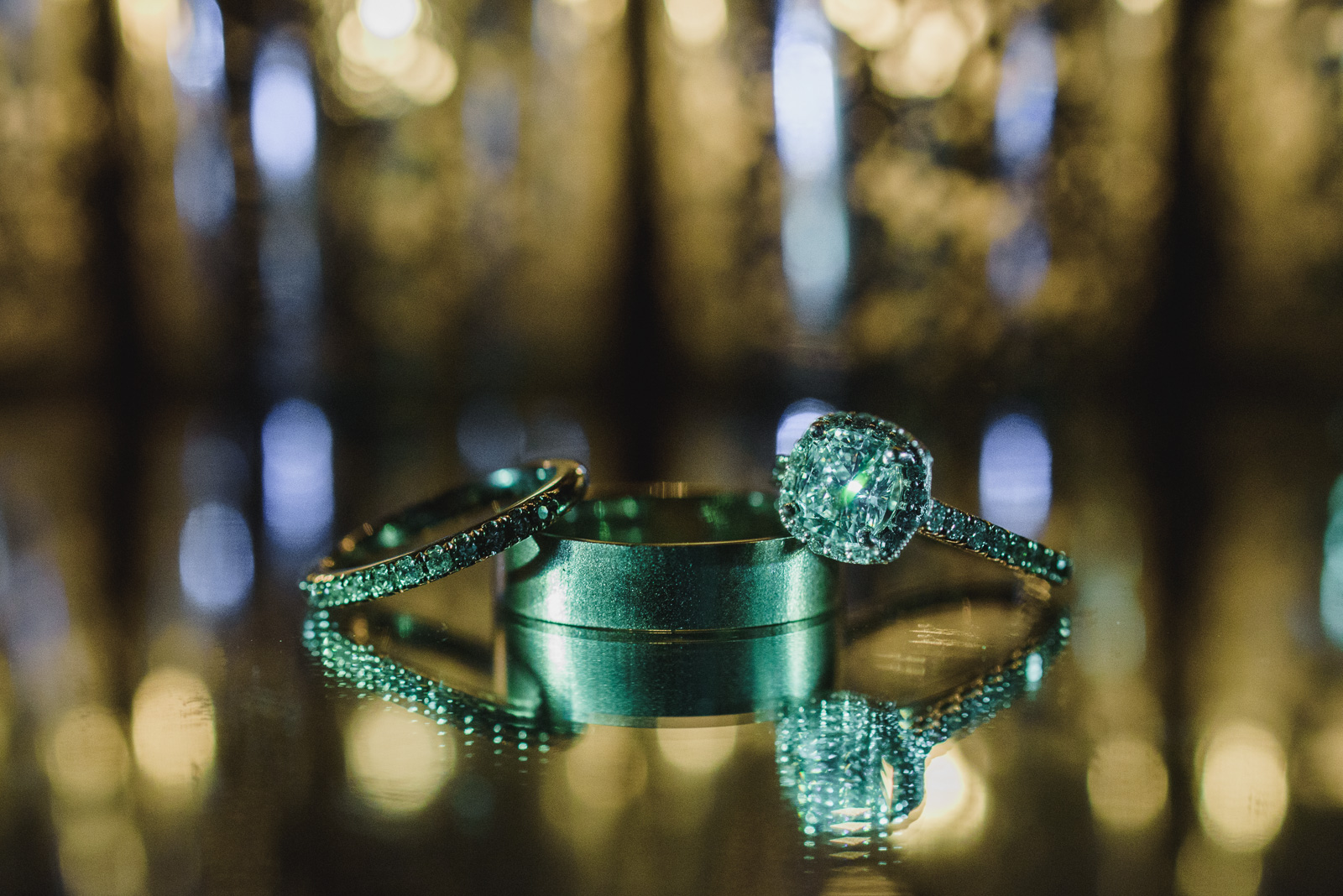 creative lighting picture of wedding rings at the Pear Tree Restaurant in Burnaby BC - Vancouver Island Wedding Photographer