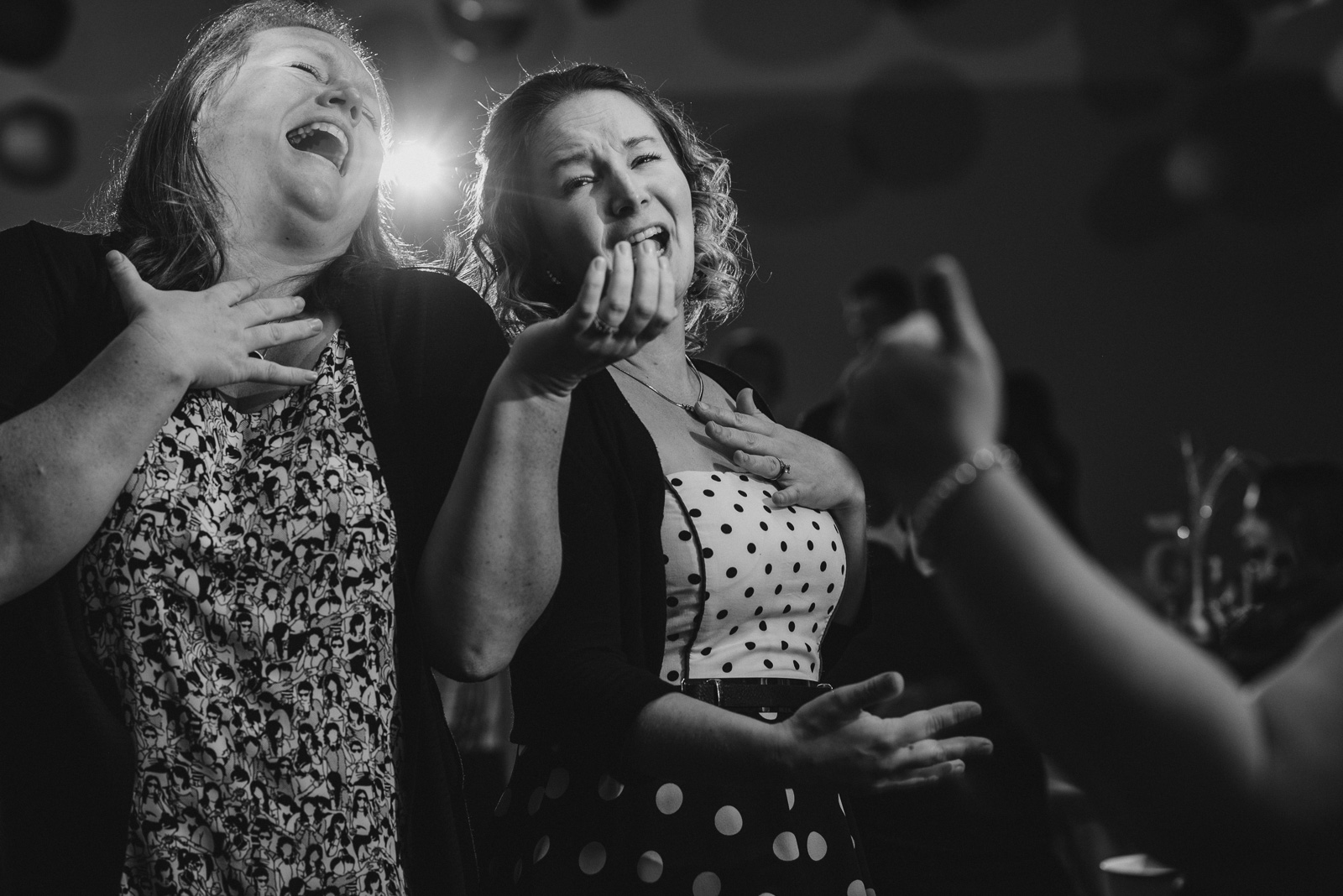 women singing on the dance floor at Whonnock Lake Centre in Maple Ridge - Victoria Wedding Photographers