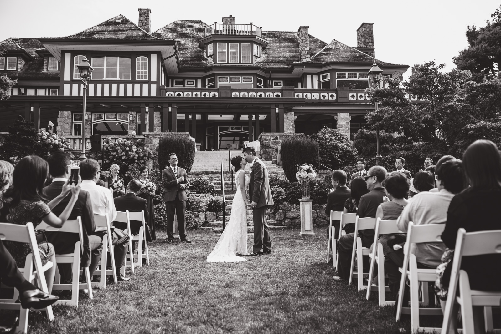 wedding first kiss at cecil green park house on ubc campus in vancouver - victoria wedding photographers
