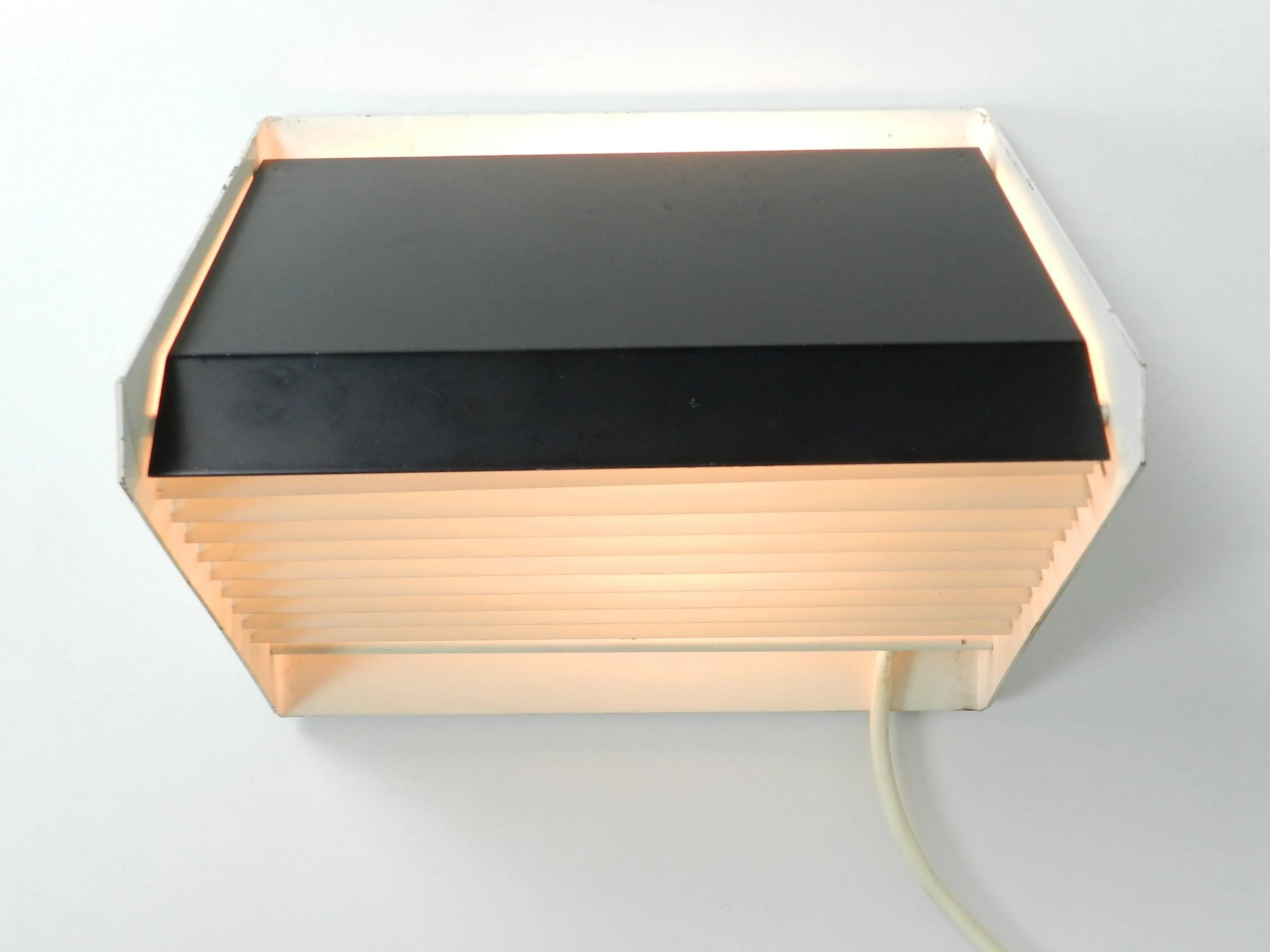 Mid century modern rare wall lamp by Raak.  Netherlands, 1960s.